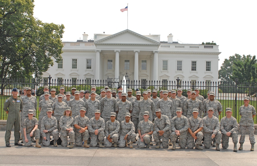 WASHINGTON - Airmen from the 4th Fighter Wing, Seymour Johnson Air Force Base, N.C., posed in front of the White House while touring the area June 1, 2011. The 4th Fighter Wing was awarded the inaugural Doolittle Award by the Air Force Historical Foundation June 2, 2011. The James H. "Jimmy" Doolittle Award recognizes a unit that has displayed bravery, determination, discipline, esprit de corps and superior management of joint operations while accomplishing its mission under extremely difficult and hazardous conditions in multiple conflicts, making a sustained, significant contribution to Air Force history. (U.S. Air Force photo/Senior Airman Gino Reyes)(Released)