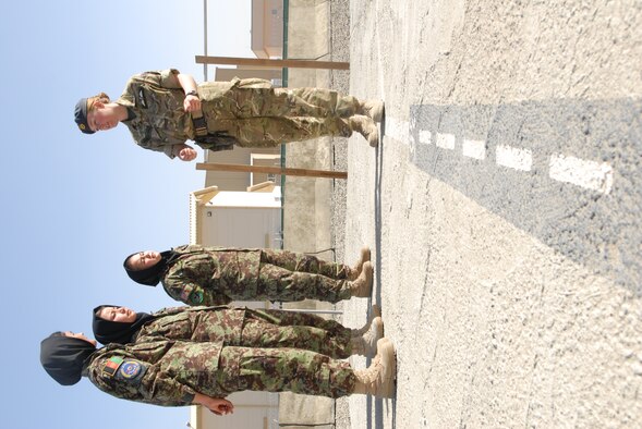 6/1/2011 – KABUL, Afghanistan – Royal Air Force Flying Officer Emma Atkinson, instructs Afghan Lieutenants at the Thunder Lab located on the Afghan Air Force compound.  Atkinson is the first British female officer to act as a mentor at the lab.  Thunder Lab is an English immersion lab aimed at preparing prospective Afghan lieutenants for further English and pilot training in the U.S. or United Arab Emirates.  (U.S. Air Force photo by Tech. Sgt. Brian E. Christiansen)