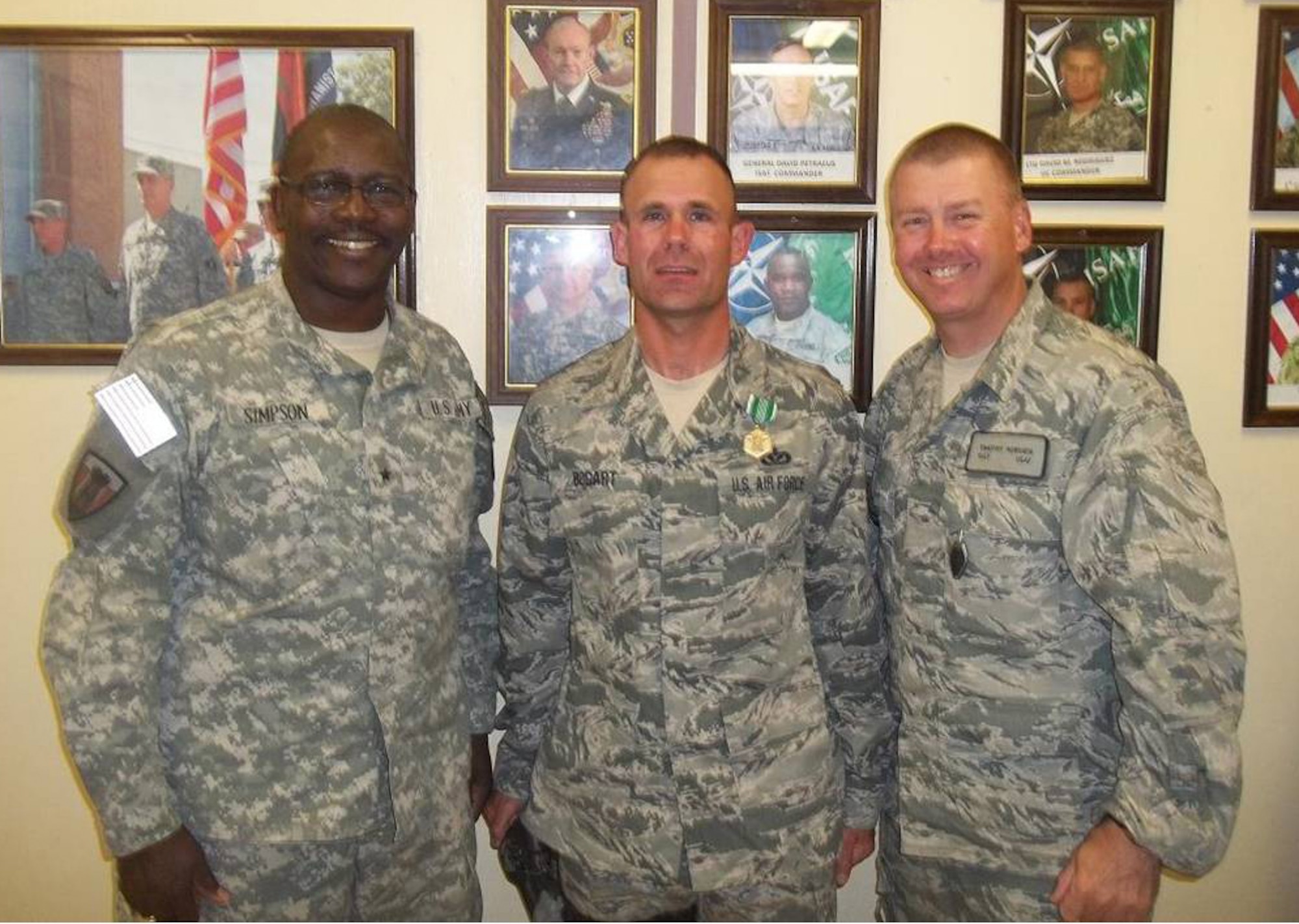 BAGRAM AIRFIELD, Afghanistan – (from left) Army Brig. Gen. Lester Simpson, 176th Engineer Brigade commander, Master Sgt. John Bogart, 577th Expeditionary Prime Beef Squadron engineering assistant and Master Sgt. Timothy Horvath, 577th EPBS first sergeant, pose for a photograph after General Simpson awarded Sergeant Bogart the Army Commendation Medal at Forward Operating Base Sharana June 4. Sergeant Bogart received the medal for his performance in the Task Force Hammer 3rd Quarter NCO Board competition, hosted by the Army’s 176th EN BDE. (Courtesy photo)