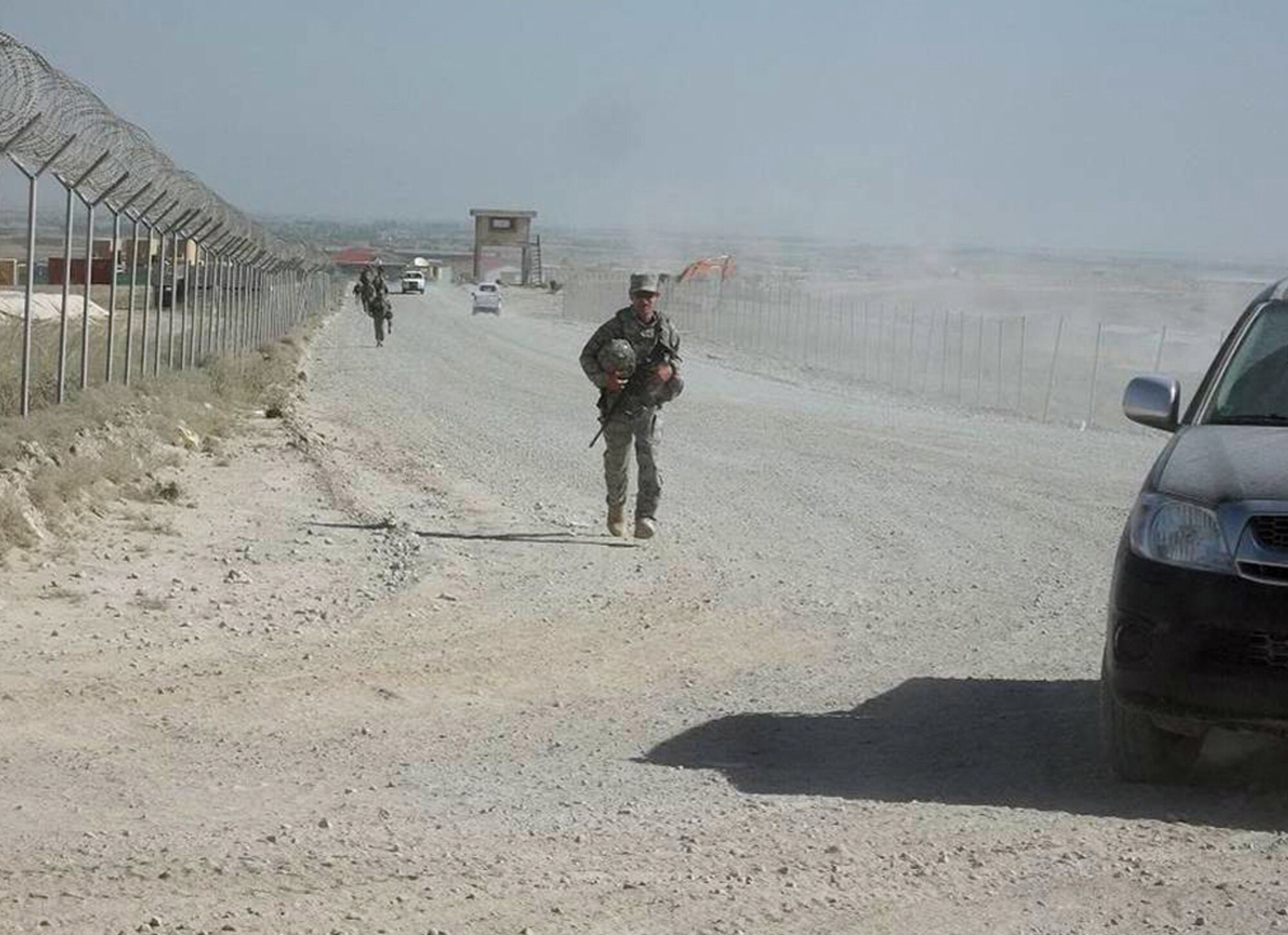 BAGRAM AIRFIELD, Afghanistan -- Master Sgt. John Bogart, 577th Expeditionary Prime Beef Squadron engineering assistant, surges out in front of the pack in a 3.3 kilometer road march during the Task Force Hammer 3rd Quarter NCO Board competition at Forward Operating Base Sharana June 3. The competition was hosted by the Army’s 176th Engineer Brigade. Sergeant Bogart finished with a top time of 24:43 and was the overall competition winner. (Courtesy photo)