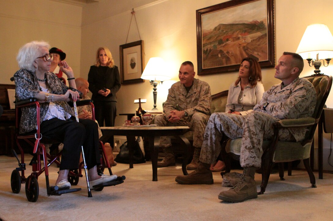 Ninety-two-year-old Alice O'Neill Avery sits with Brig. Gen. Vincent A. Coglianese, commanding general, Marine Corps Installations – West, Marine Corps Base Camp Pendleton as she recollects past experiences she had at the base’s Historical Ranch House as a child, May 7. The Historical Ranch House was the homestead of the O'Neill Family before the southern portion was purchased by the Department of the Navy in 1942, in support of the war effort.  Since then, the O’Neil family has continued to maintain a positive link between themselves and the military base they once called home by annually visiting the base to see its progress.
