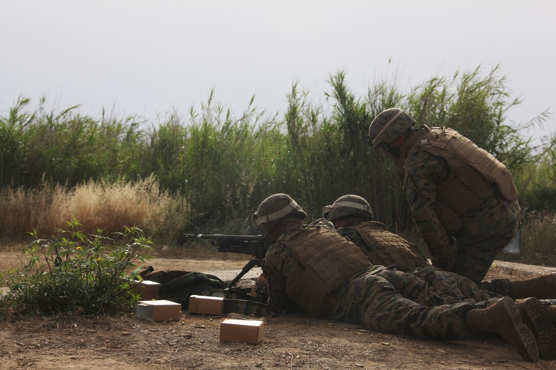 Marines with Golf Company, Battalion Landing Team, 2nd Battalion, 2nd Marine Regiment, 22nd Marine Expeditionary Unit fire M-240G machine guns during a Greek bilateral exercise in Maleme, Crete, Greece, June 9, 2011.  Elements of Combat Logistics Battalion 22, the BLT and force reconnaissance platoon participated in the training with the Greek military in Crete.  The Marines and sailors of the 22nd MEU are currently deployed with Amphibious Squadron 6 aboard the USS Bataan Amphibious Ready Group serving as a flexible, formidable and potent force who continues to train and improve their capability to operate as a cohesive and effective Marine Air Ground Task Force.  The 22nd MEU is a multi-mission, capable force comprised of an Aviation Combat Element, Marine Medium Tilt Rotor Squadron 263 (Reinforced); a Logistics Combat Element, CLB 22; a Ground Combat Element, BLT, 2nd Bat., 2nd Mar., Reg.; and its Command Element.