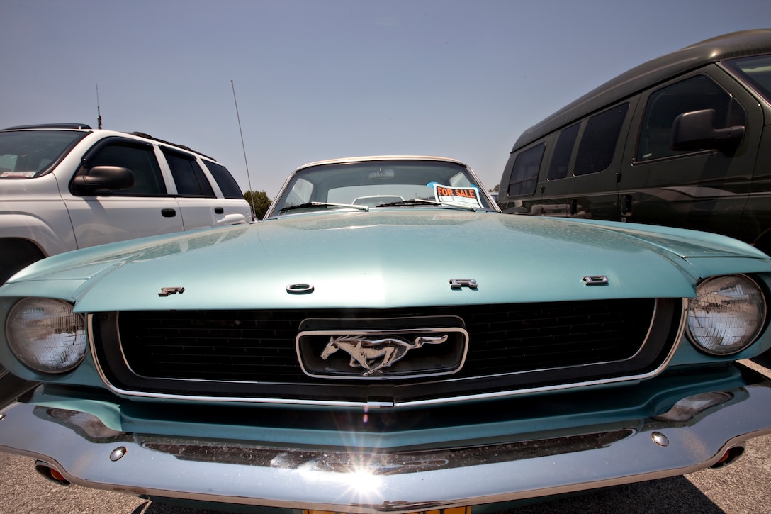A 1966 Ford Mustang waits for potential new owners in the Marine Corps Community Services Resale Lot aboard Marine Corps Base Camp Lejeune.  The Resale Lot, in the parking lot near the Commissary and Marine Corps Exchange, is available to any Department of Defense identification cardholders who want to sell their car, truck, motorcycle, boat or RV.
