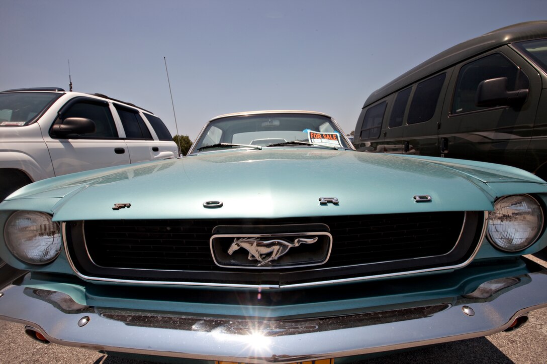 A 1966 Ford Mustang waits for potential new owners in the Marine Corps Community Services Resale Lot aboard Marine Corps Base Camp Lejeune.  The Resale Lot, in the parking lot near the Commissary and Marine Corps Exchange, is available to any Department of Defense identification cardholders who want to sell their car, truck, motorcycle, boat or RV.