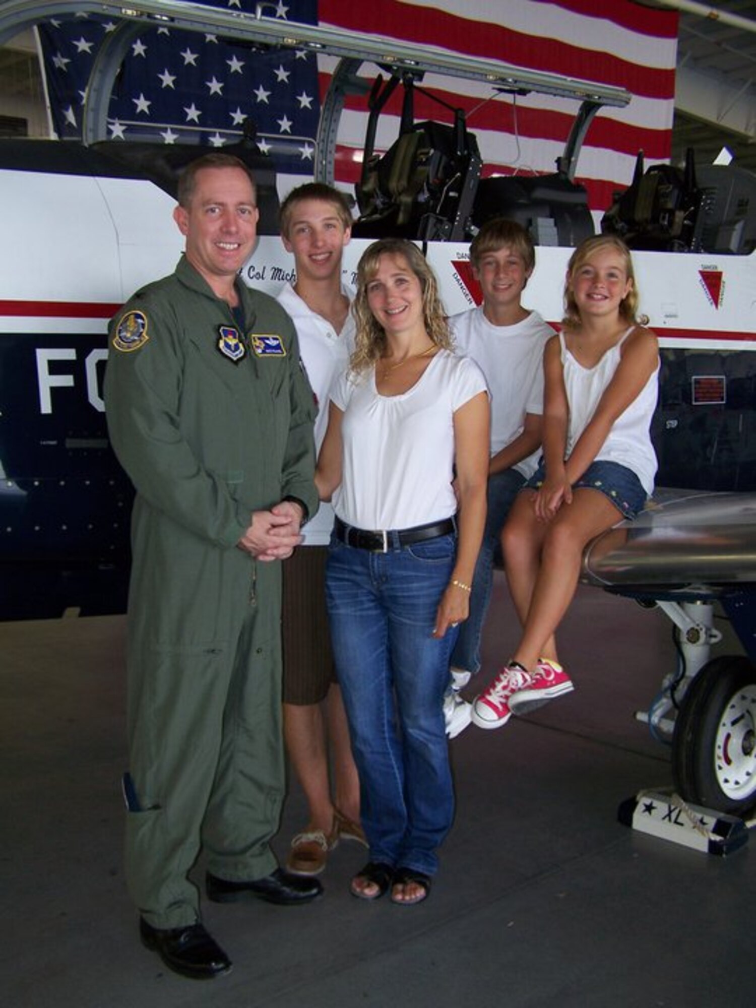 LAUGHLIN AIR FORCE BASE, Texas -- Colonel Michael Frankel, 47th Flying Training Wing commander, and his family pose in front of a T-6 aircraft here at Laughlin. (contributed photo)