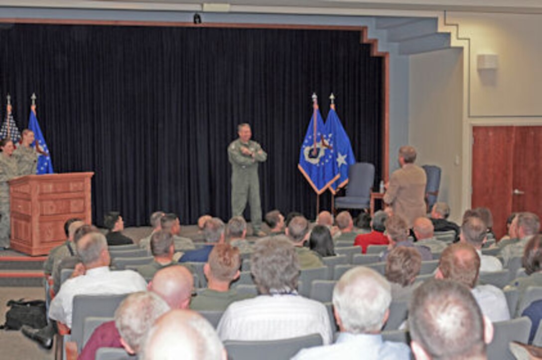 KIRTLAND AFB, N.M. – Maj. Gen. Greg Feest, Air Force Safety Center commander, answers a question from Mr. Jay Johnson, Chief, AFSC Analysis and Integration Division, during a commander’s call here, March 31.  General Feest urges Airmen of all ranks to tell the Air Force safety story by sharing their safety experiences and lessons learned with others (Air Force photo/Dennis Spotts).