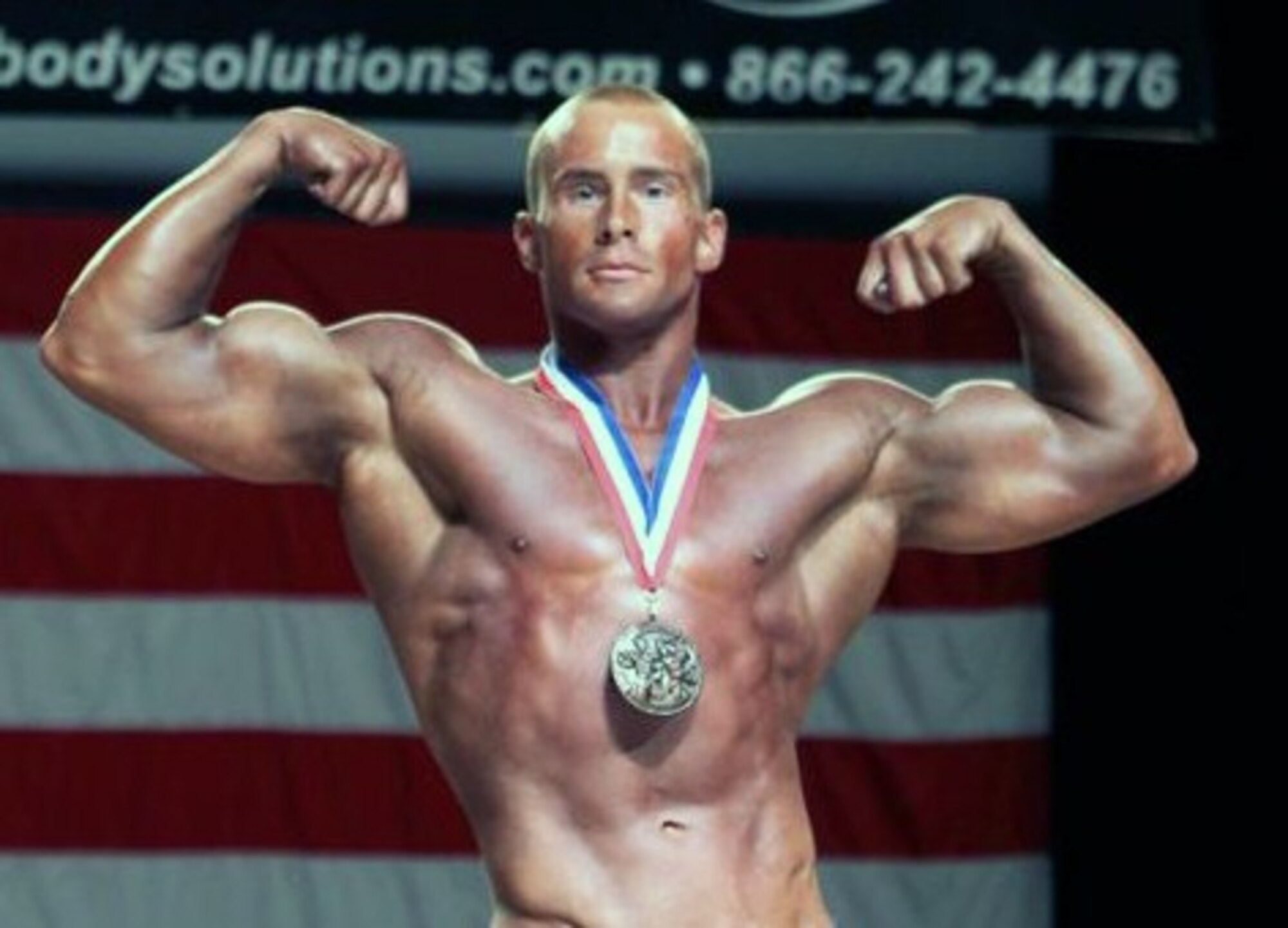 Airman 1st Class Clint Shields, 460th Contracting Squadron, contracting specialist, took home first place in two categories at the 2011 National Physique Committee, General Nutrition Center Southern Colorado and Armed Forces bodybuilding and physique championships in Colorado Springs, Colo. on May 14, 2011.
