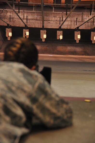 SEYMOUR JOHNSON AIR FORCE BASE, N.C.- Master Sgt. Christina Davison aims at a target sheet during a combat arms training and maintenance course here, June 8, 2011. Sergeant Davison is preparing for an upcoming deployment. CATM is responsible to train all Seymour Johnson personnel on small arms weapons.  Sergeant Davison is a 916th Air Refueling Wing aerospace medicine superintendent and a native of Santa Cruz, Calif. (U.S. Air Force photo/Senior Airman Whitney Lambert)(RELEASED)