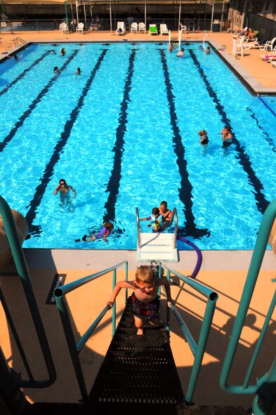 LAUGHLIN AIR FORCE BASE, Texas -- Laughlin members cool off after a long day here at Laughlin's Friendship Pool June 8. The pool opened Memorial Day weekend after undergoing a $132,000 pool repair project in the off season to more efficiently support the Laughlin community. (U.S. Air Force photo by Senior Airman Scott Saldukas)