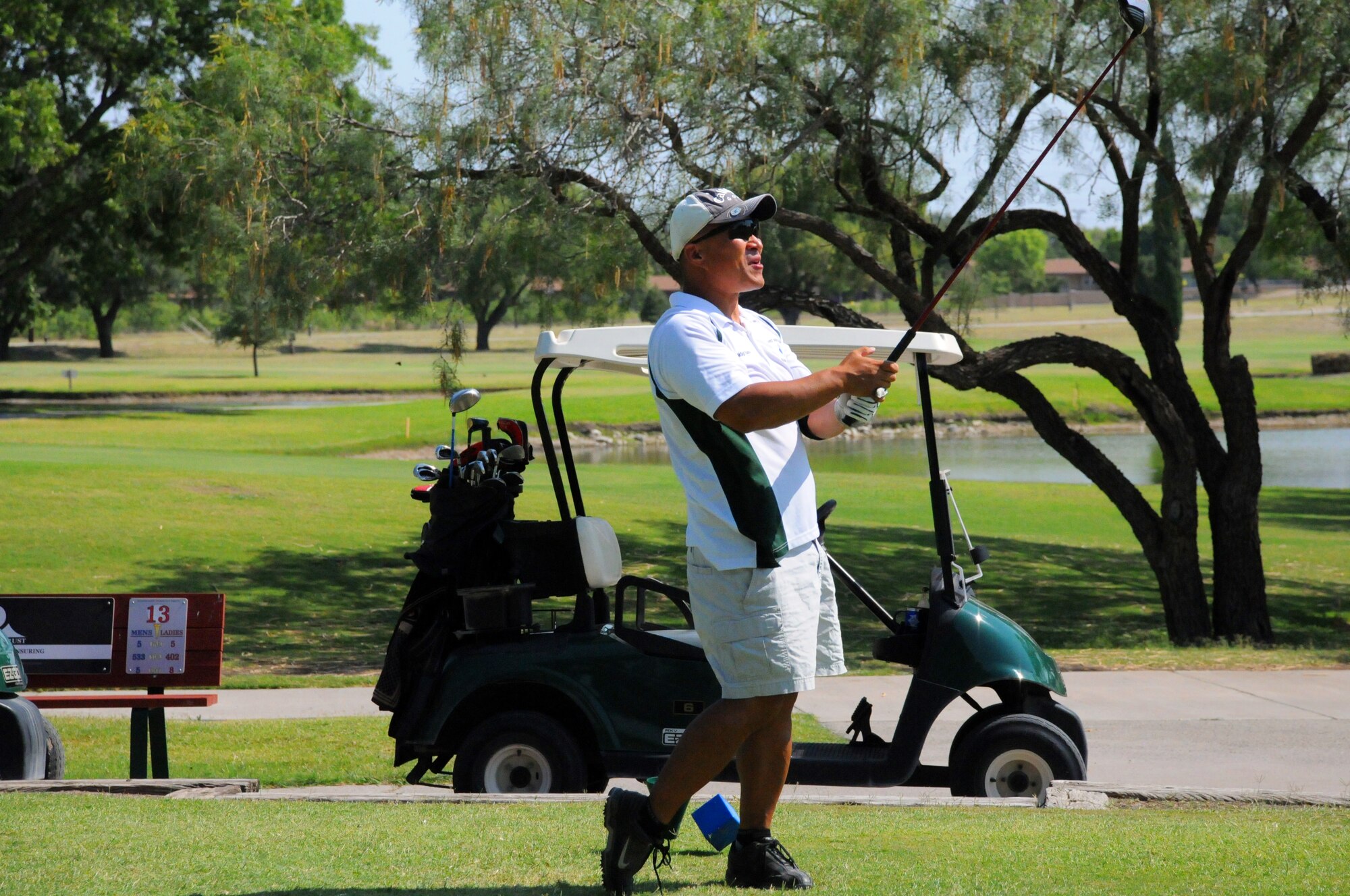 LAUGHLIN AIR FORCE BASE, Texas -- Master Sgt. James Escher, 47th Mission Support Group, looks down the fairway after a drive during a Chiefs and Shirts versus Commanders Golf Tournament here recently. (U.S. Air Force photo by Senior Airman Scott Saldukas)