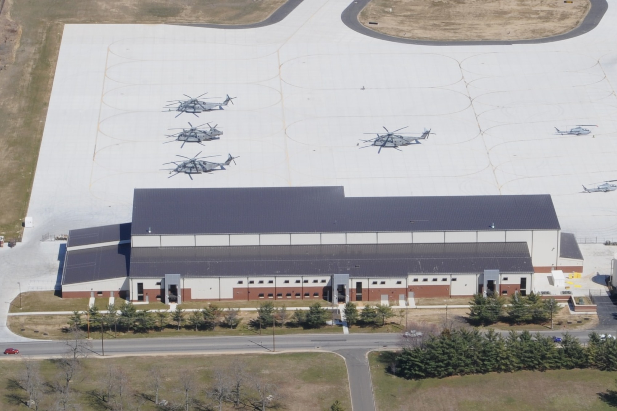 Marine Aircraft Group 49, Marine Heavy Helicopter Squadron 772 and Marine Light Attack Helicopter Squadron 773 moved to Joint Base McGuire-Dix-Lakehurst recently due to the closure of Naval Air Station Joint Reserve Base Willow Grove, Penn. The $66-million facility is Leadership in Energy & Environmental Design compliant, which means the hangar provides a healthier work and living environment. (U.S. Air Force photo by Airman 1st Class Dennis Sloan/Released)