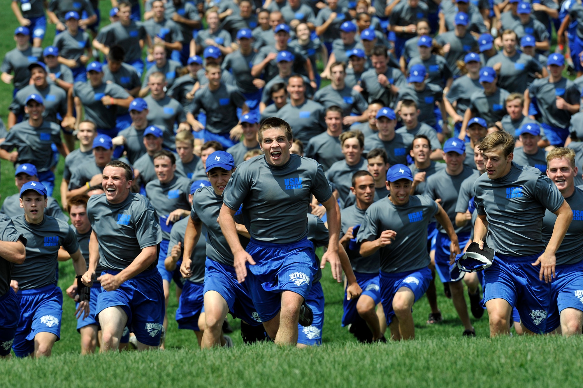 High school students storm the hill in the Terrazzo during the Air Force Academy's Summer Seminar June 1, 2011. The Academy Admissions office holds three seminars for approximately 1,100 juniors and seniors each year, immersing them in a three-day microcosm of Academy life. (U.S. Air Force photo/Bill Evans)