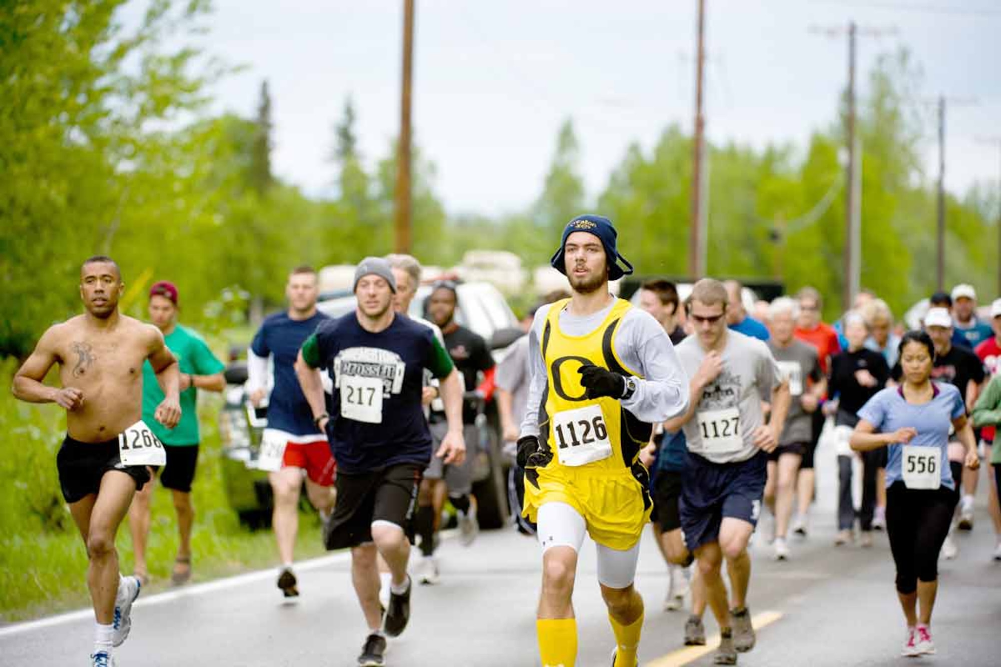 The runners leave the start point at the beginning of the Arctic Valley Run, a 37-year tradition on Fort Richardson. (U.S. Air Force photos\Johnathon Green)