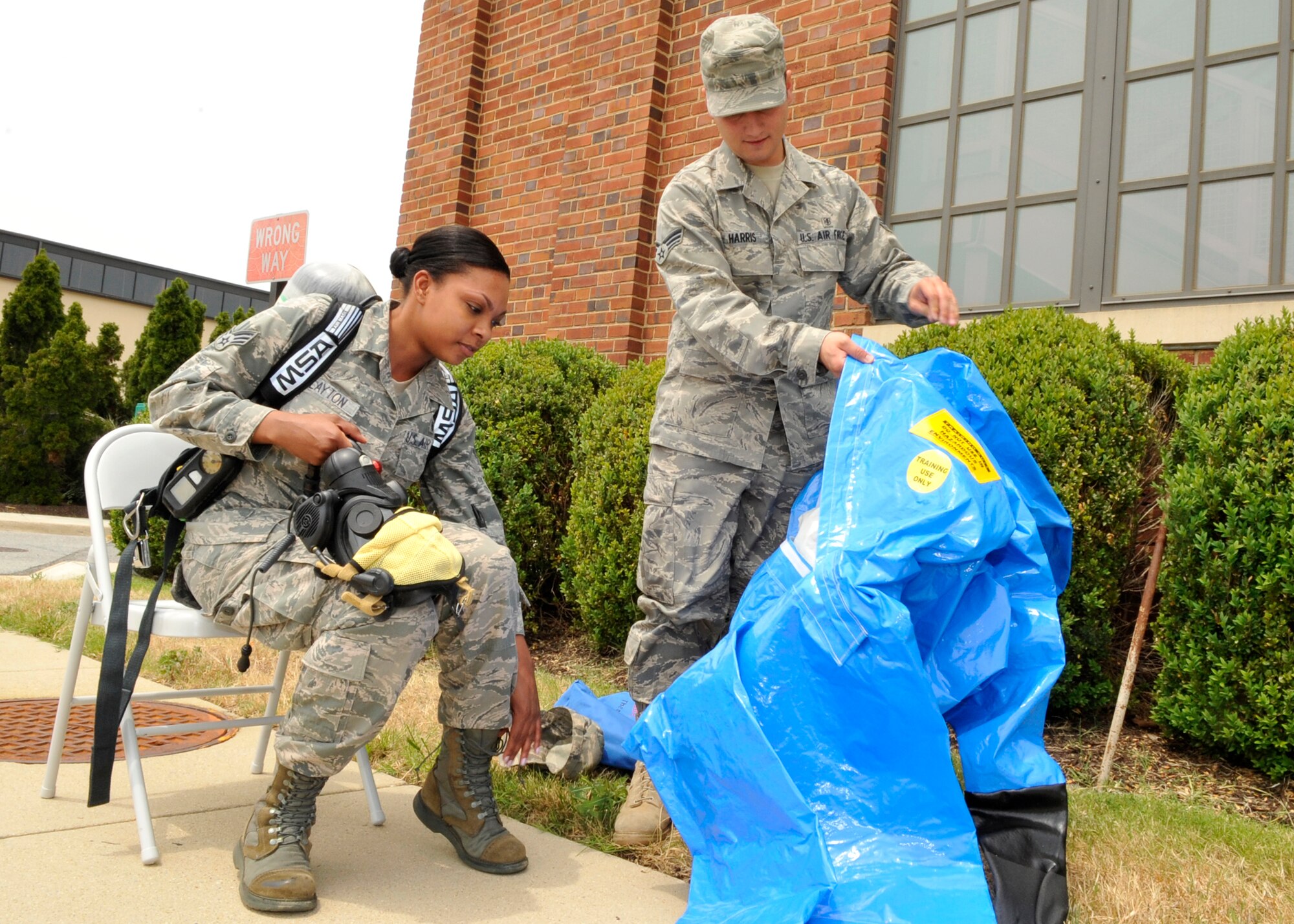 Senior Airman Irealous Layton, 579th Medical Operations Squadron bioenvironmental engineering technician, suits up in hazardous material “Level A” protective gear Tuesday, June 7. This suit is usually worn in unknown chemical, biological, radiological, nuclear, and explosive events or immediately dangerous to life or health atmospheres. (U.S. Air Force photo/Senior Airman Laura Turner)