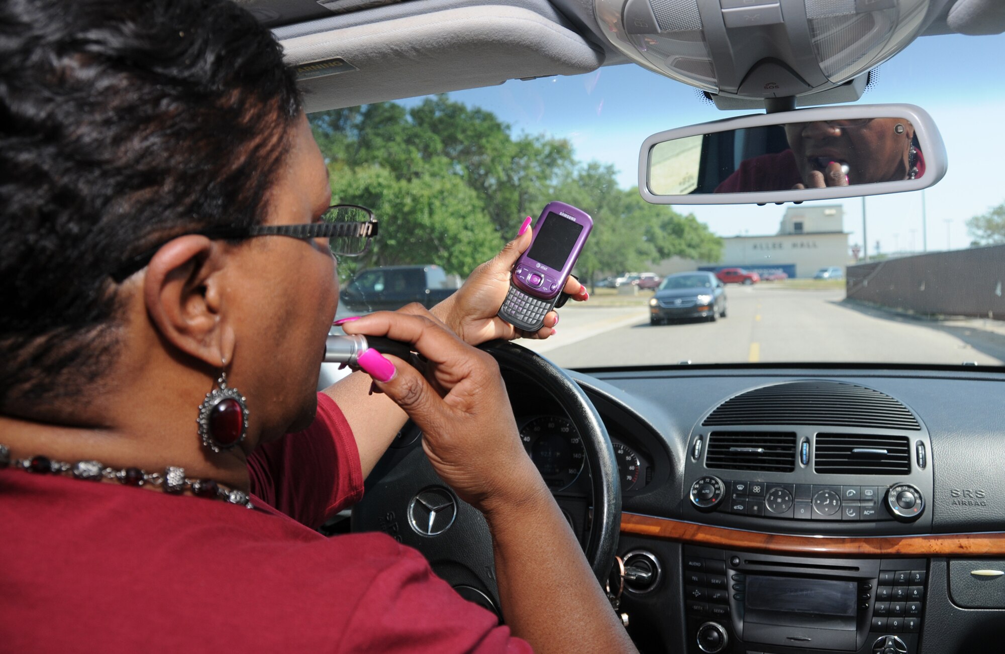Behind the desk, multi-tasking can be a valuable, time saving skill. But behind the wheel it can be very dangerous. In 2009, 30 percent of all automobile accidents were caused by distracted driving.  (U.S. Air Force photo illustration by Kemberly Groue)