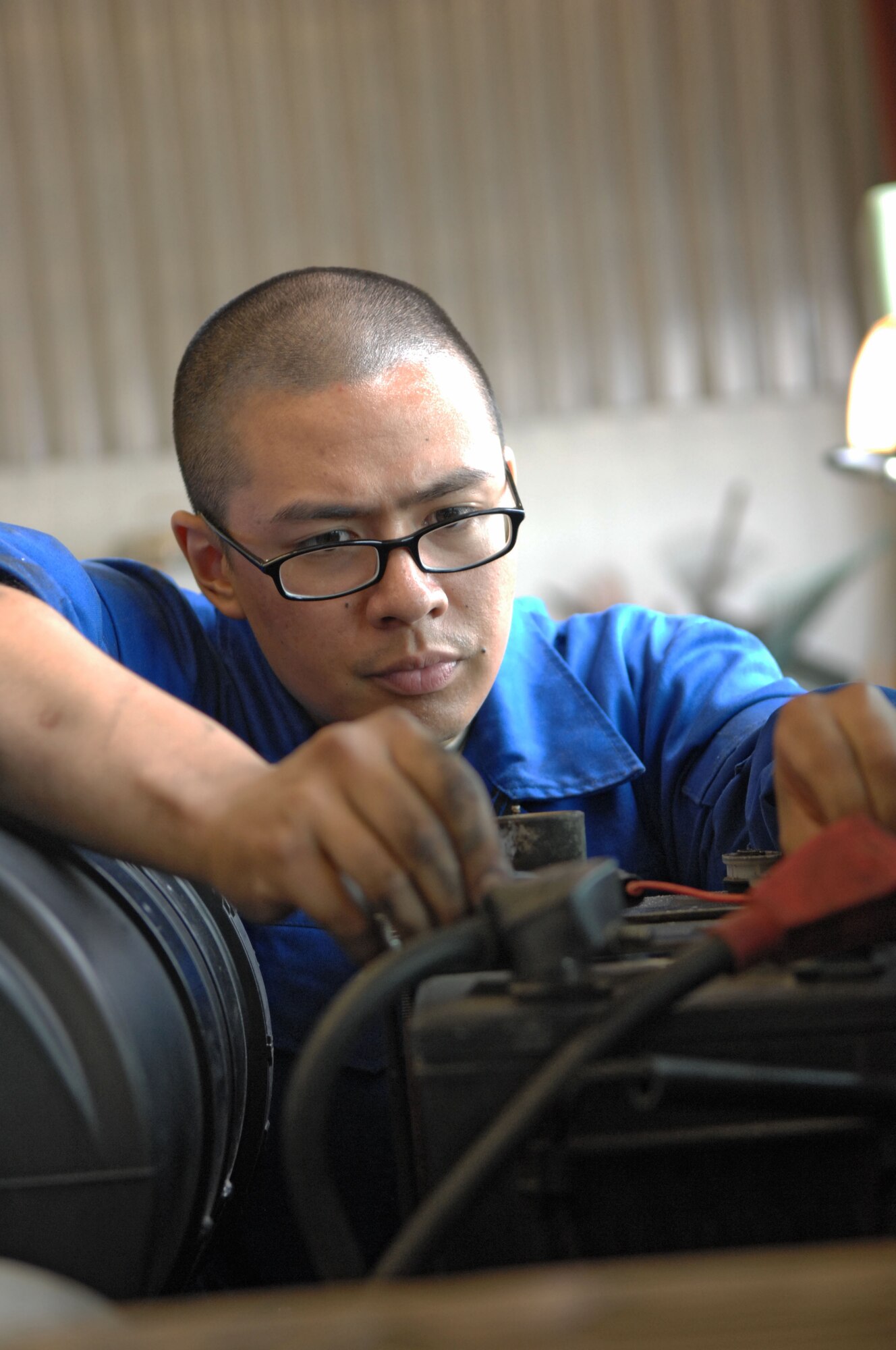 SPANGDAHLEM AIR BASE, Germany – Airman 1st Class Jason Cenidoza, 52nd Logistics Readiness Squadron vehicle maintenance apprentice, performs a function check after working on a truck here June 8. The vehicle maintenance flight fixes and inspects heavy equipment in need of maintenance and repair. (U.S. Air Force photo/Airman 1st Class Matthew B. Fredericks)