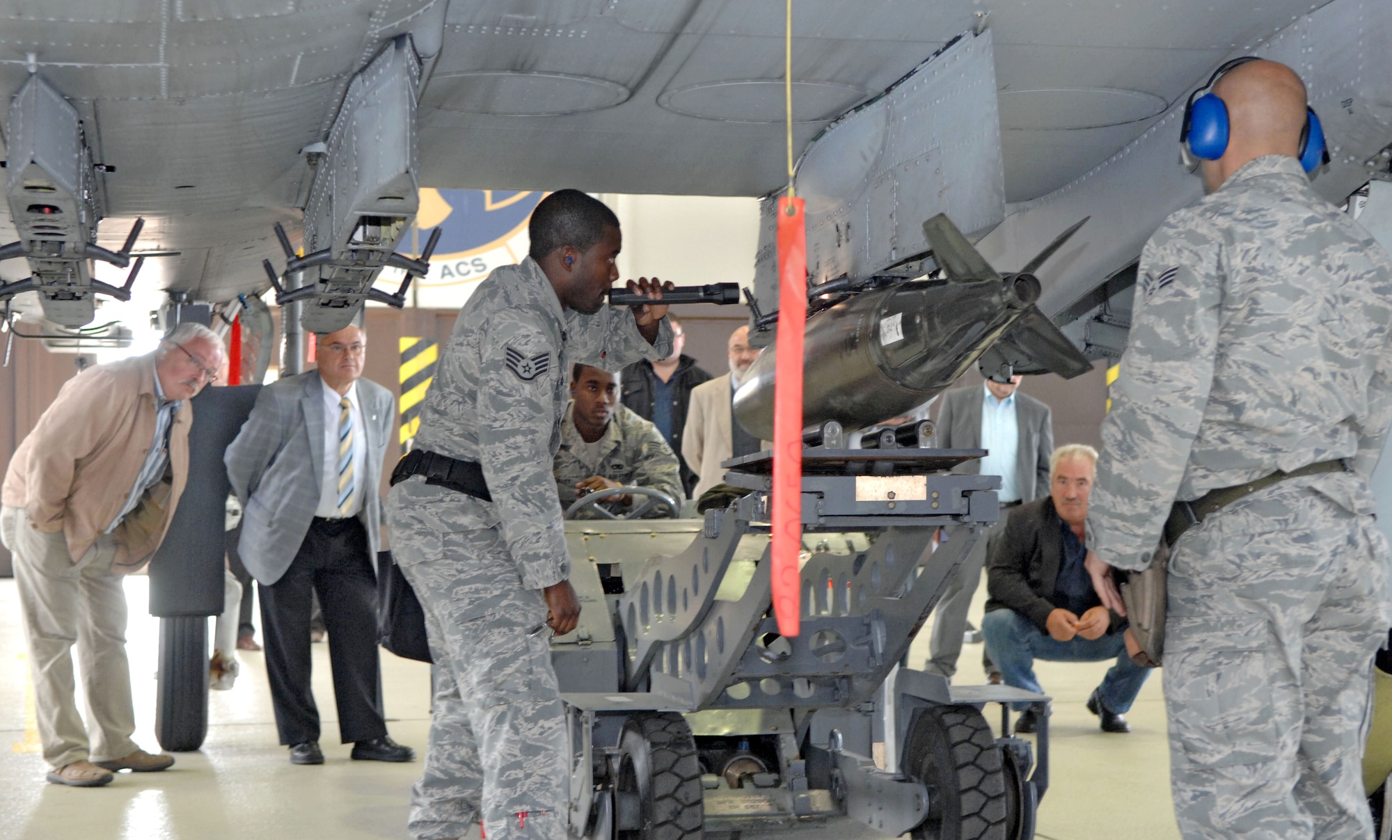 SPANGDAHLEM AIR BASE, Germany – Civic leaders watch 52nd Maintenance Operations Squadron Airmen load an A-10 Thunderbolt II during a demonstration here June 8. Civic leaders from the region around Spangdahlem Air Base visited the base to familiarize themselves with how the 52nd Fighter Wing operates. (U.S. Air Force photo/Airman 1st Class Matthew B. Fredericks)