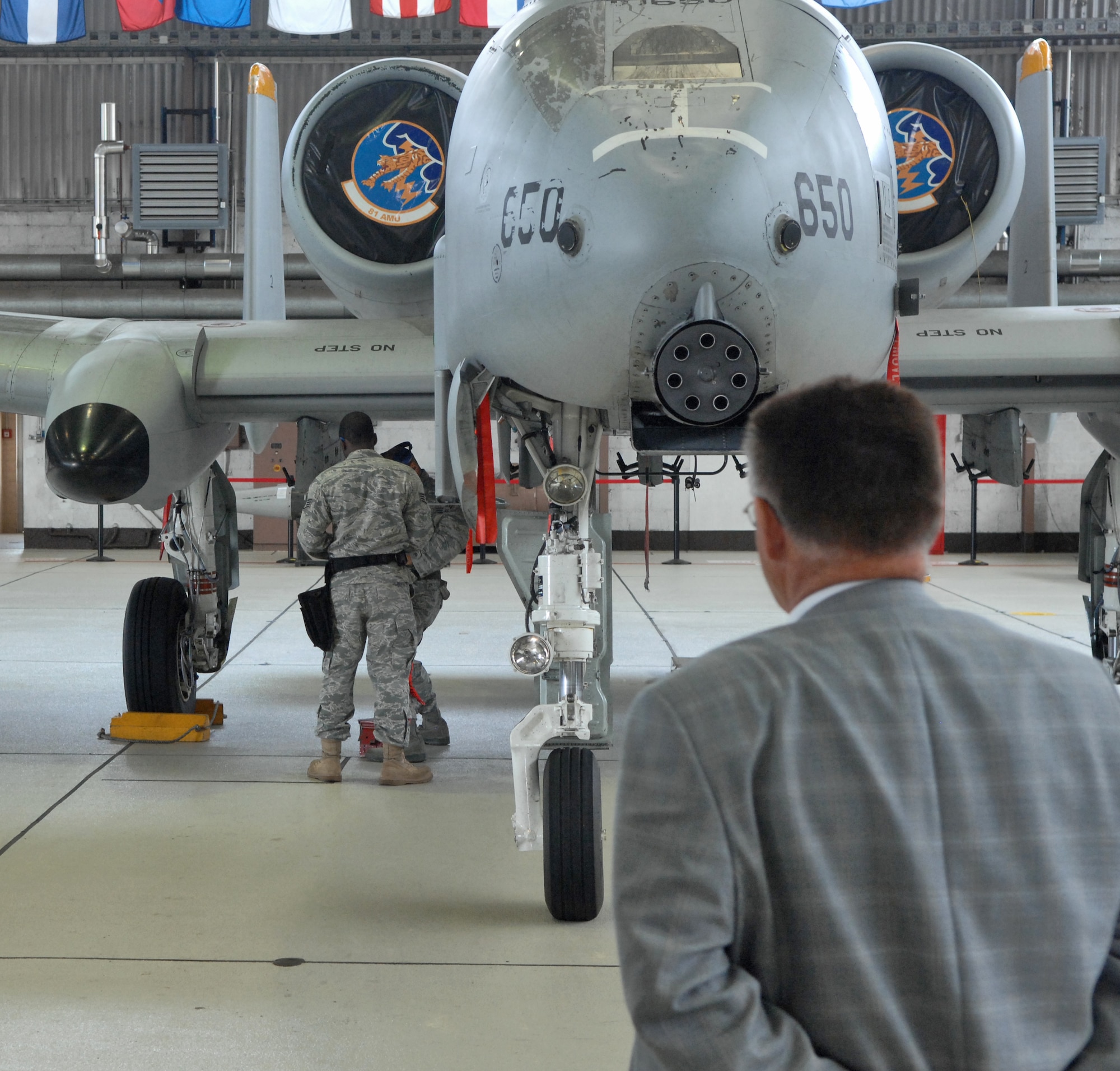 SPANGDAHLEM AIR BASE, Germany – Speicher Mayor Rudolf Becker watches as 52nd Maintenance Operations Squadron Airmen load an A-10 Thunderbolt II during a demonstration here June 8. Civic leaders from the region around Spangdahlem Air Base visited the base to familiarize themselves with how the 52nd Fighter Wing operates. (U.S. Air Force photo/Airman 1st Class Matthew B. Fredericks)