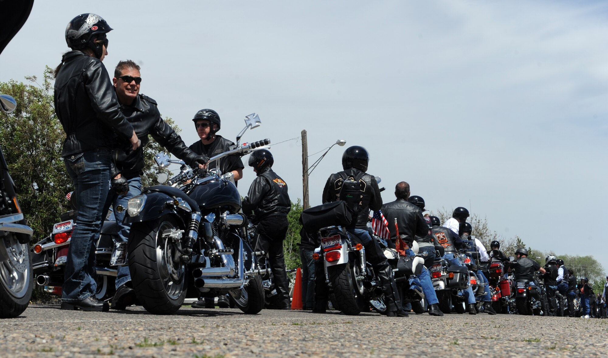 MOUNTAIN HOME, Idaho – Motorcyclists participating in Patriot Thunder event take a moment to relax at Eastside Park before a presentation to honor local military personnel here June 5. More than $25,000 was raised to support Operation Warmheart, the Wounded Warrior Fund and Idaho Guard and Reserve Family Support Fund. (U.S. Air Force photo by Senior Airman Debbie Lockhart)