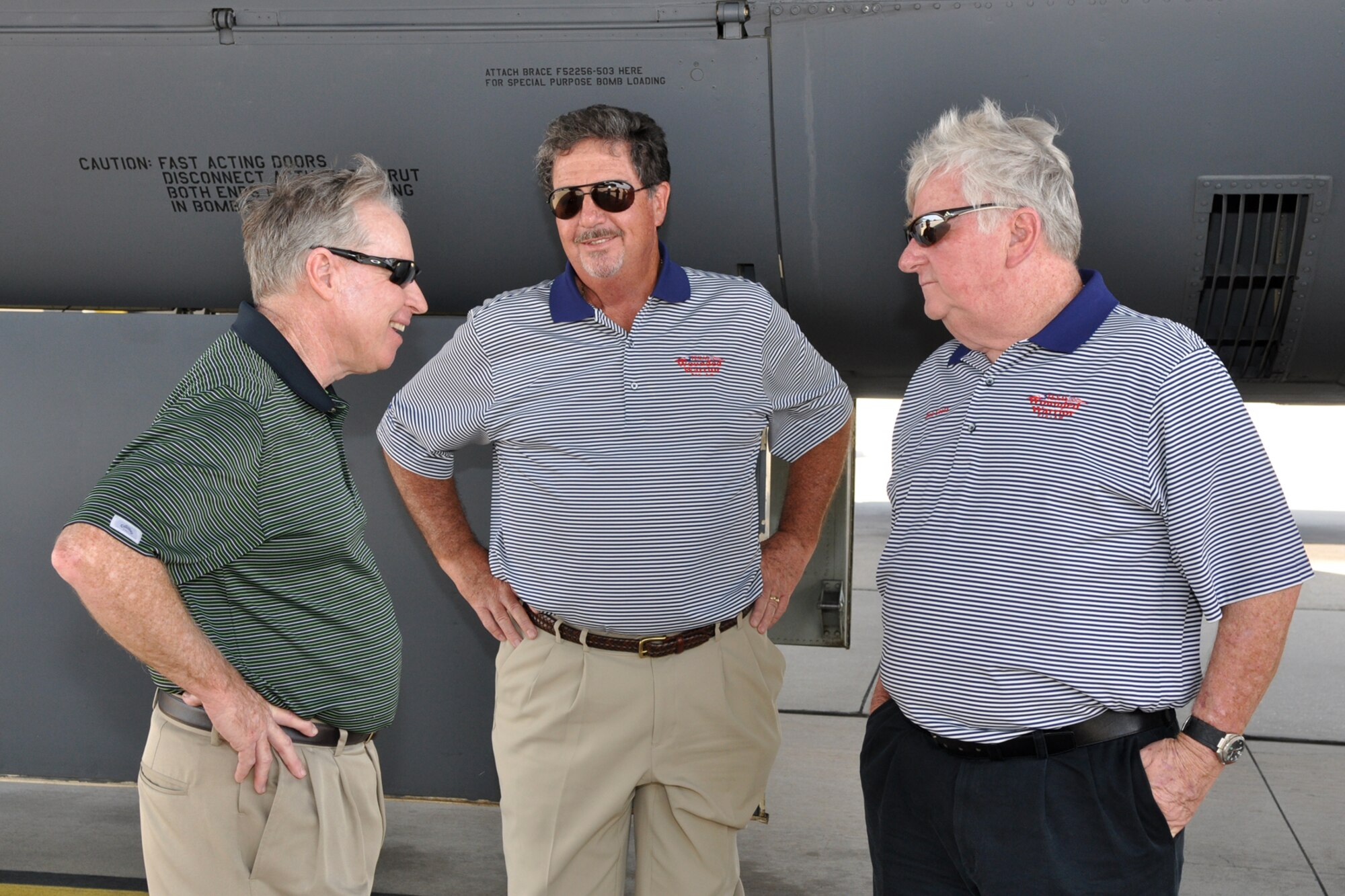 Brig. Gen. (Ret) Jack Ihle, a former commander of the 917th Wing, speaks with Harley Wilke and Dick Goetz, two of the founders of Texas Wounded Warrior, on the ramp at Barksdale Air Force Base, La., May 24, 2011. The founder’s group made the stop at Barksdale AFB for a briefing on the Air Force Reserve from Brig. Gen. John J. Mooney III, commander, 307th Bomb Wing, and a close-up look at 307th BW assets. Texas Wounded Warrior, an organization founded by golfers, makes it part of its mission to honor, and to empower our Wounded Warriors by providing them a weekend of fun, fellowship and entertainment on the golf course. (U.S. Air Force photo/Tech. Sgt. Jeff Walston)