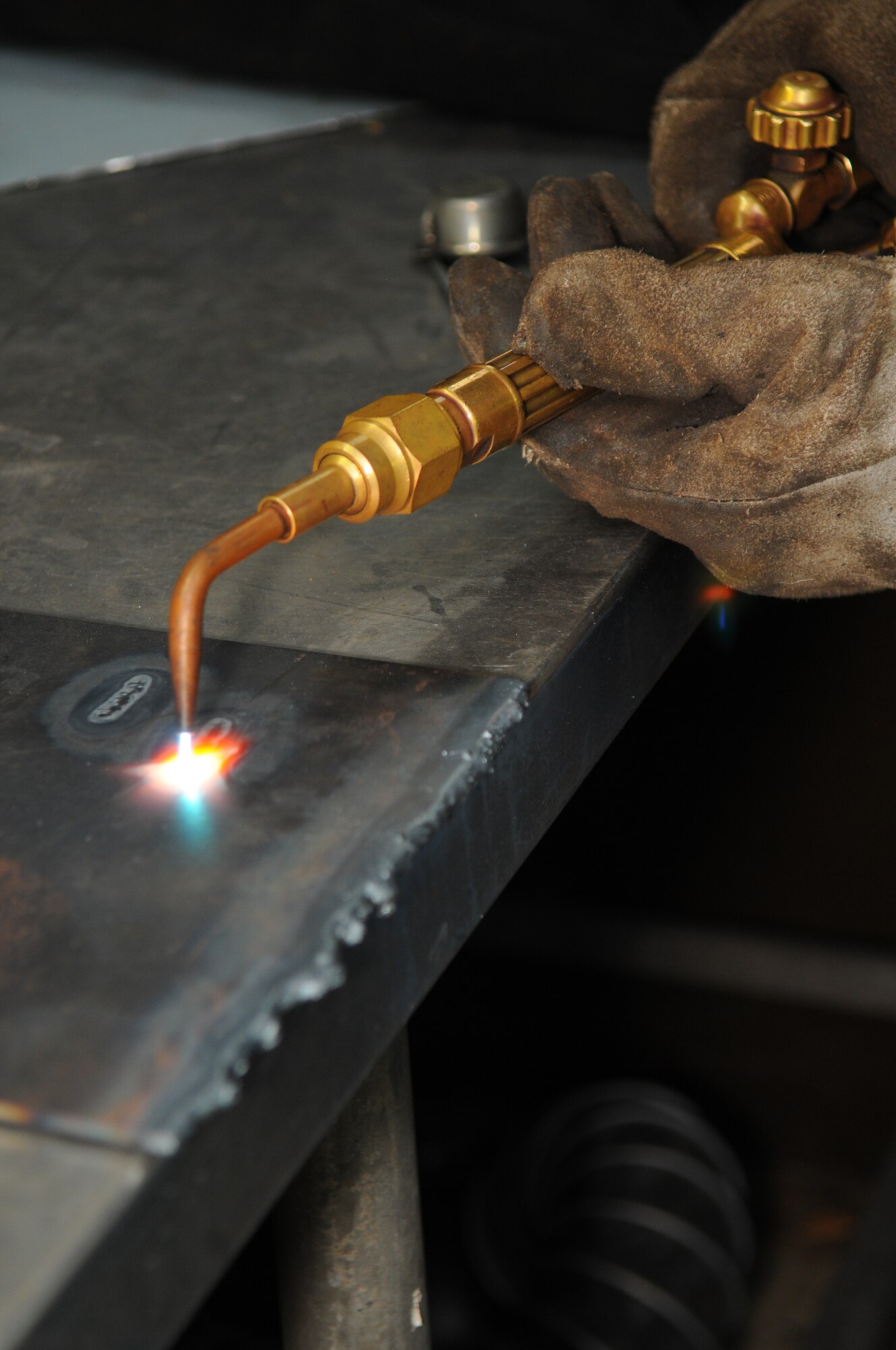 SPANGDAHLEM AIR BASE, Germany – A student uses an oxygen and acetylene torch to practice making a welding bead at the auto skills center here June 8. Welding classes are offered monthly at Spangdahlem’s auto skills center. (U.S. Air Force photo/Airman 1st Class Dillon Davis)