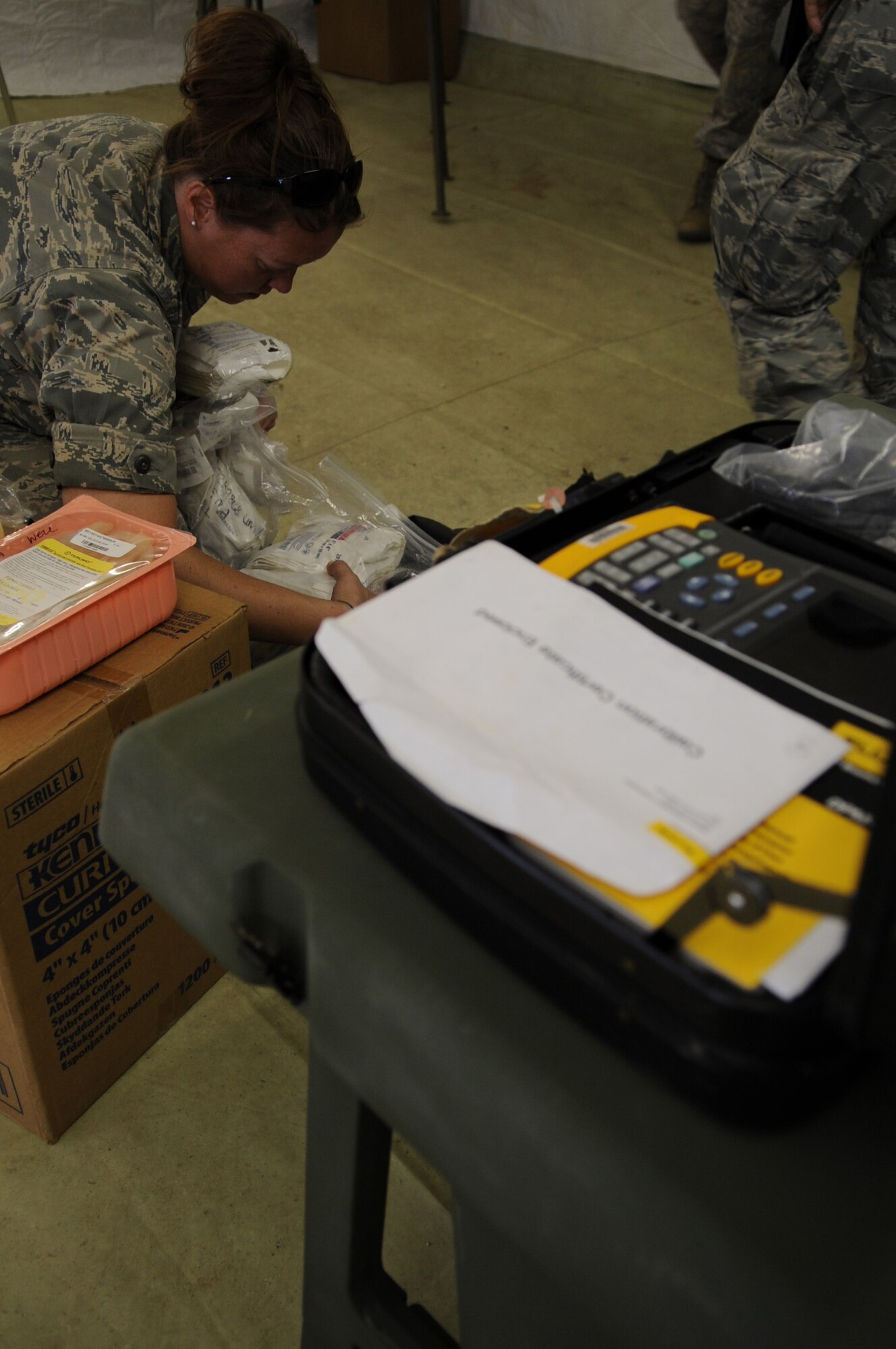 Capt. Stacey Balicki, 31st Medical Group from Aviano Air Base, Italy, unpacks medical supplies into a field hospital in preparation for the hands-on portion of Medical Training Exercise in Central and Eastern Europe 2011 June 8. An annual Chairman of the Joint Chiefs of Staff-sponsored regional and multilateral exercise, MEDCEUR is designed to provide medical training and operational experience in a deployed environment for U.S. and partner nations. The countries participating in this year?s MEDCEUR are Macedonia, Montenegro, Bosnia and Herzegovina, Serbia, Slovenia and Norway.  The exercise will include both classroom and hands-on training and run until June 15. (U.S. Air Force photo/Staff Sgt. Nadine Y. Barclay)
