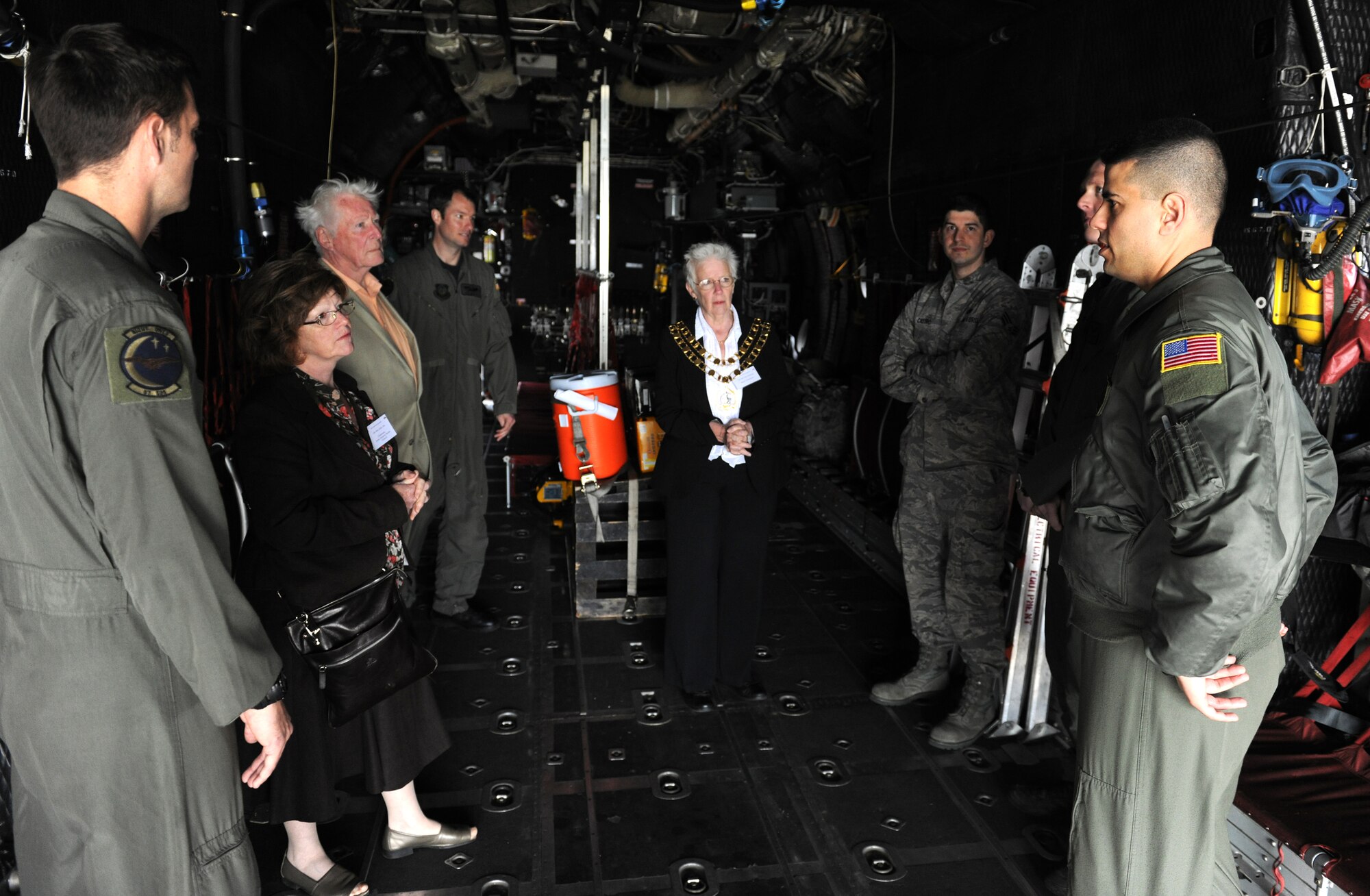 Airmen from the 67th Special Operations Squadron, RAF Mildenhall, describe the MC-130P Combat Shadow to local civic leaders during the RAF Fairford Civic Leaders Tour June 8. The Combat Shadow participated in the Royal International Air Tattoo Media Day and Civic Leaders Tour to highlight U.S. Air Force support for both RIAT and community engagement. (U.S. Air Force photo/1st Lt. Brian Maguire)
