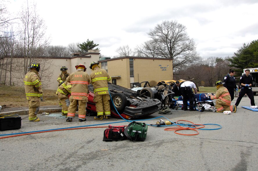 HANSCOM AIR FORCE BASE, Mass. – During the last Base Readiness Exercise in April, first responders respond to an auto extraction scenario at the corner of Randolph Road and Tinker Loop. Another BRE is scheduled next week to help base personnel prepare for a possible Operational Readiness Inspection in the fall. (U.S. Air Force photo by Linda LaBonte Britt)