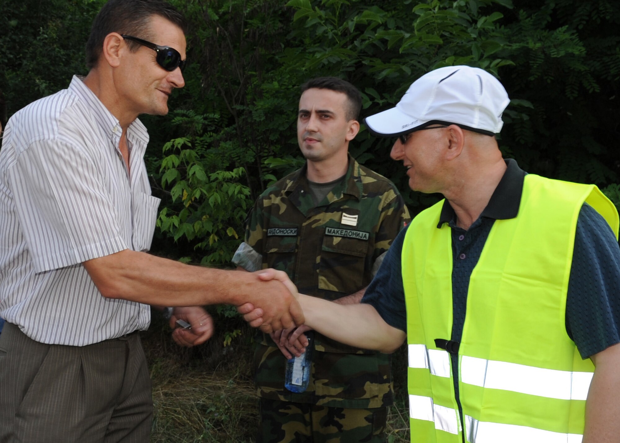 CAMP PEPELISHTE, Macedonia -- Col. Charles Tedder, the American co-director for Medical Training Exercise in Central and Eastern Europe 2011, is interviewed by a local Macedonian television station during the MEDCEUR 11 volunteer day June 8. An annual Chairman of the Joint Chiefs of Staff-sponsored regional and multilateral exercise, MEDCEUR is designed to provide medical training and operational experience in a deployed environment for U.S. and partner nations. The countries participating in this year’s MEDCEUR are Macedonia, Montenegro, Bosnia and Herzegovina, Serbia, Slovenia and Norway.  The exercise will include both classroom and hands-on training and run until June 15. (U.S. Air Force photo/Staff Sgt. Nadine Y. Barclay)