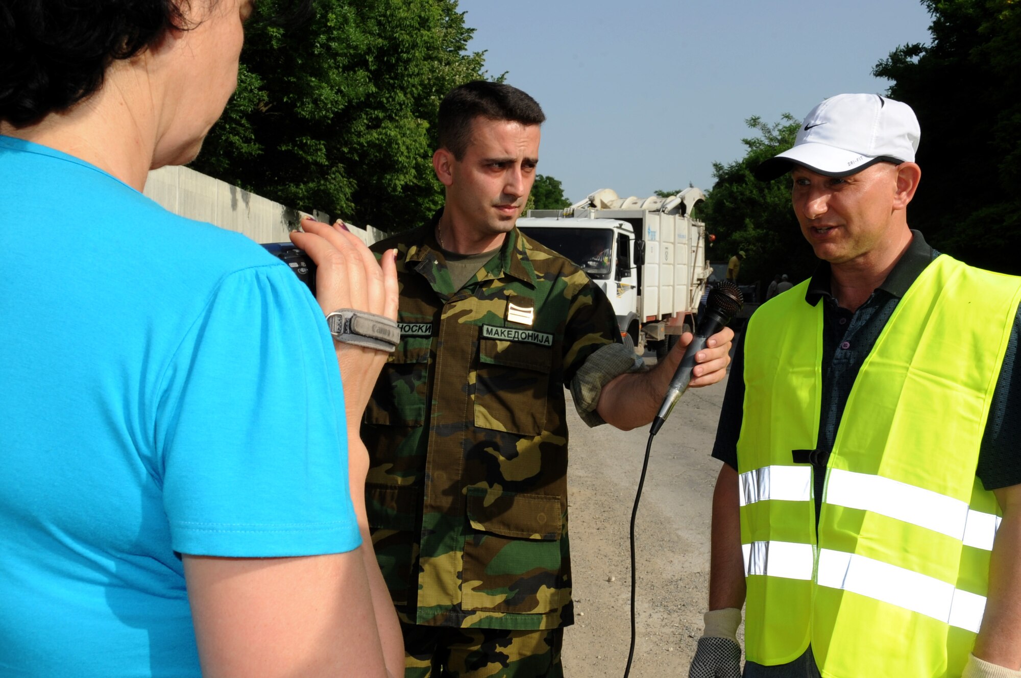 CAMP PEPELISHTE, Macedonia -- Col. Charles Tedder, the American co-director for Medical Training Exercise in Central and Eastern Europe 2011, is interviewed by a local Macedonian television station during the MEDCEUR 11 volunteer day June 8. An annual Chairman of the Joint Chiefs of Staff-sponsored regional and multilateral exercise, MEDCEUR is designed to provide medical training and operational experience in a deployed environment for U.S. and partner nations. The countries participating in this year’s MEDCEUR are Macedonia, Montenegro, Bosnia and Herzegovina, Serbia, Slovenia and Norway.  The exercise will include both classroom and hands-on training and run until June 15. (U.S. Air Force photo/Staff Sgt. Nadine Y. Barclay)