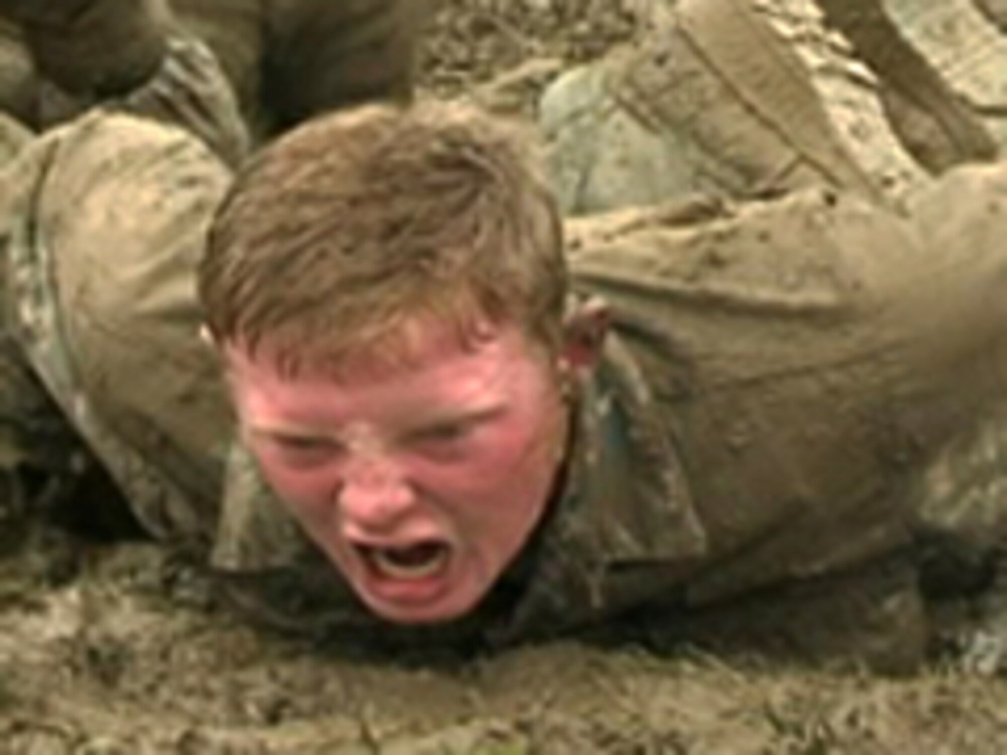 Airman Thomas Abbott, 18th Security Forces, completes a stack pushup as part of a Police Week tactics challenge. Police units across Okinawa gathered at Kadena Air Base to celebrate the national holiday and pay respects to men in women who have lost their lives in the line of duty. (Courtesy Photo/Released AFN Okinawa)