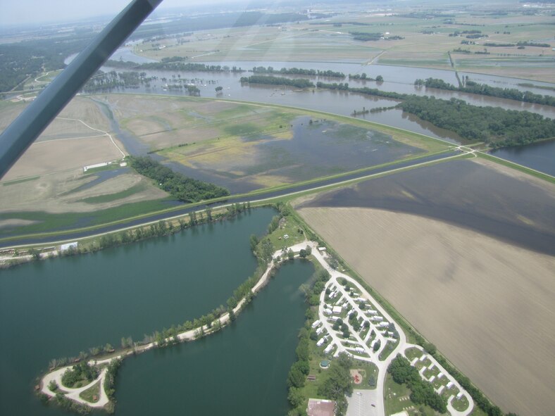 OFFUTT AIR FORCE BASE, Neb. -- An aerial photo of the Base Lake here shows the bulging Missouri River just to its east. As the water level continues to rise in the river, Offutt officials are taking precautions to protect people, equipment and facilities. The river is expected to crest by June 15. (Courtesy photo)