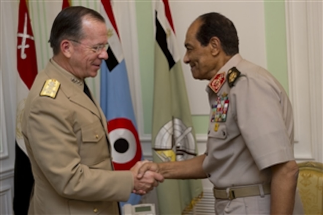 Chairman of the Joint Chiefs of Staff Adm. Mike Mullen greets Chairman of the Supreme Council of the Armed Forces of Egypt Field Marshal Mohamed Hussein Tantawi in Cairo on June 8, 2011.  Mullen is on a seven-day trip visiting Egypt and Europe to meet with counterparts and leaders.  