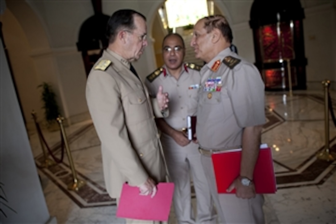 Chairman of the Joint Chiefs of Staff Adm. Mike Mullen bids farewell to Chief of Staff of the Egyptian Armed Forces Army Lt. Gen. Sami Enan in Cairo on June 8, 2011.  Mullen is on a seven-day trip visiting Egypt and Europe to meet with counterparts and leaders.  