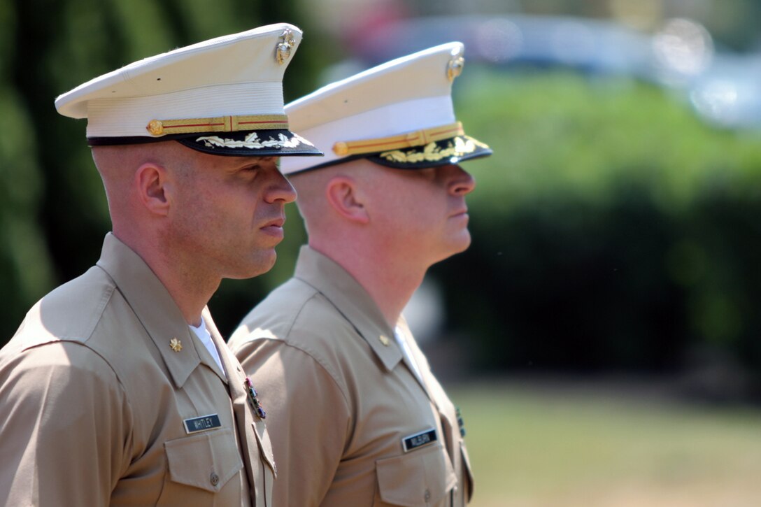 Majors Daniel M. Whitley and Matthew T. Milburn stand in formation during the Recruiting Station Albany change of command ceremony, June 10.  Whitley relinquished command to Milburn, marking the end of Whitley's three-year tenure at the helm of RS Albany.
