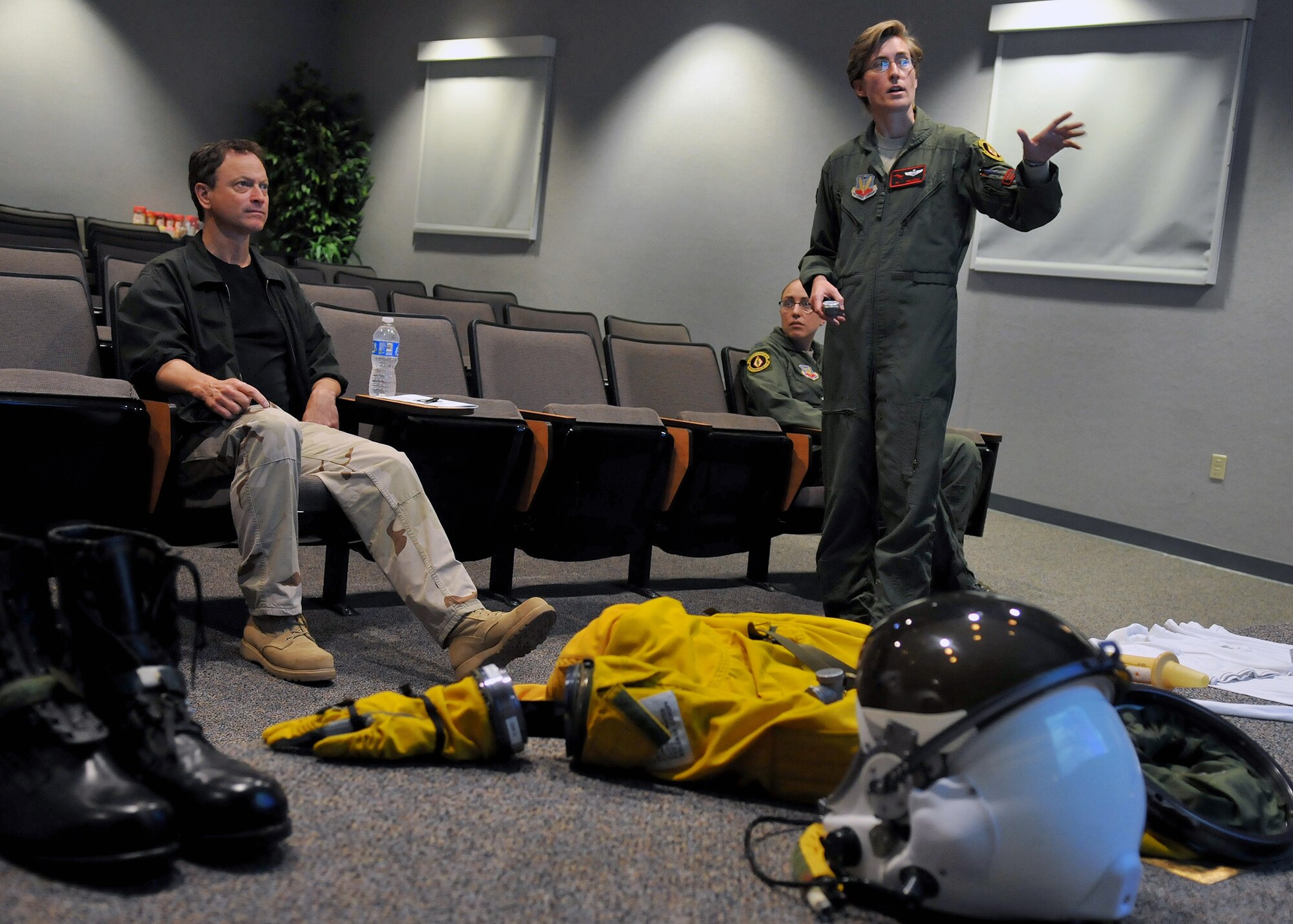 Gary Sinise receives a pre-flight briefing about the implements and functions of the U-2 Dragon Lady flight suit June 7, 2011, at Beale Air Force Base, Calif. (U.S. Air Force photo/Airman 1st Class Rebeccah Anderson)
