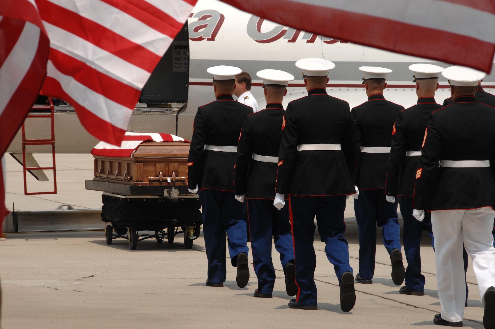 A Marine Corps Honor Guard carries Marine Cpl. Paul W. Zanowick II, of Miamisburg, Ohio during a ceremony at Wright-Patterson Air Force Base Thursday, June 9, 2011. Corporal Zanowick II died June 3 while conducting combat operations in Helmand province, Afghanistan. He was assigned to 3rd Battalion, 4th Marine Regiment, 1st Marine Division, I Marine Expeditionary Force, Twentynine Palms, Calif. (U.S. Air Force photo/Ben Strasser)