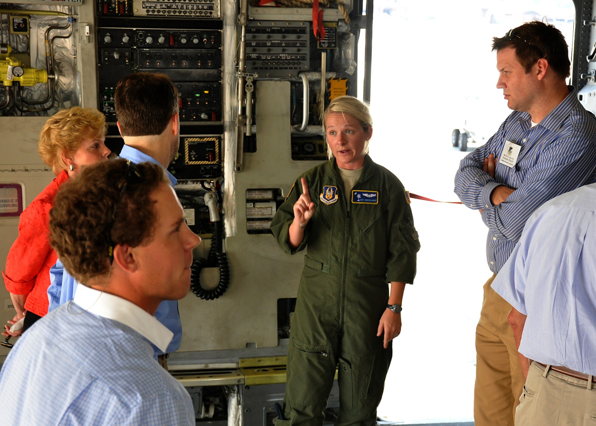 Staff Sgt. Jennifer Morse, 300th Airlift Wing loadmaster, tells members of a civic leader group from Maxwell Air Force Base, Ala. about the impressive hauling capabilities of the C-17 Globemaster during the group's visit to Charleston from  June 9, 2011.   (Air Force photo by Michael Dukes)
