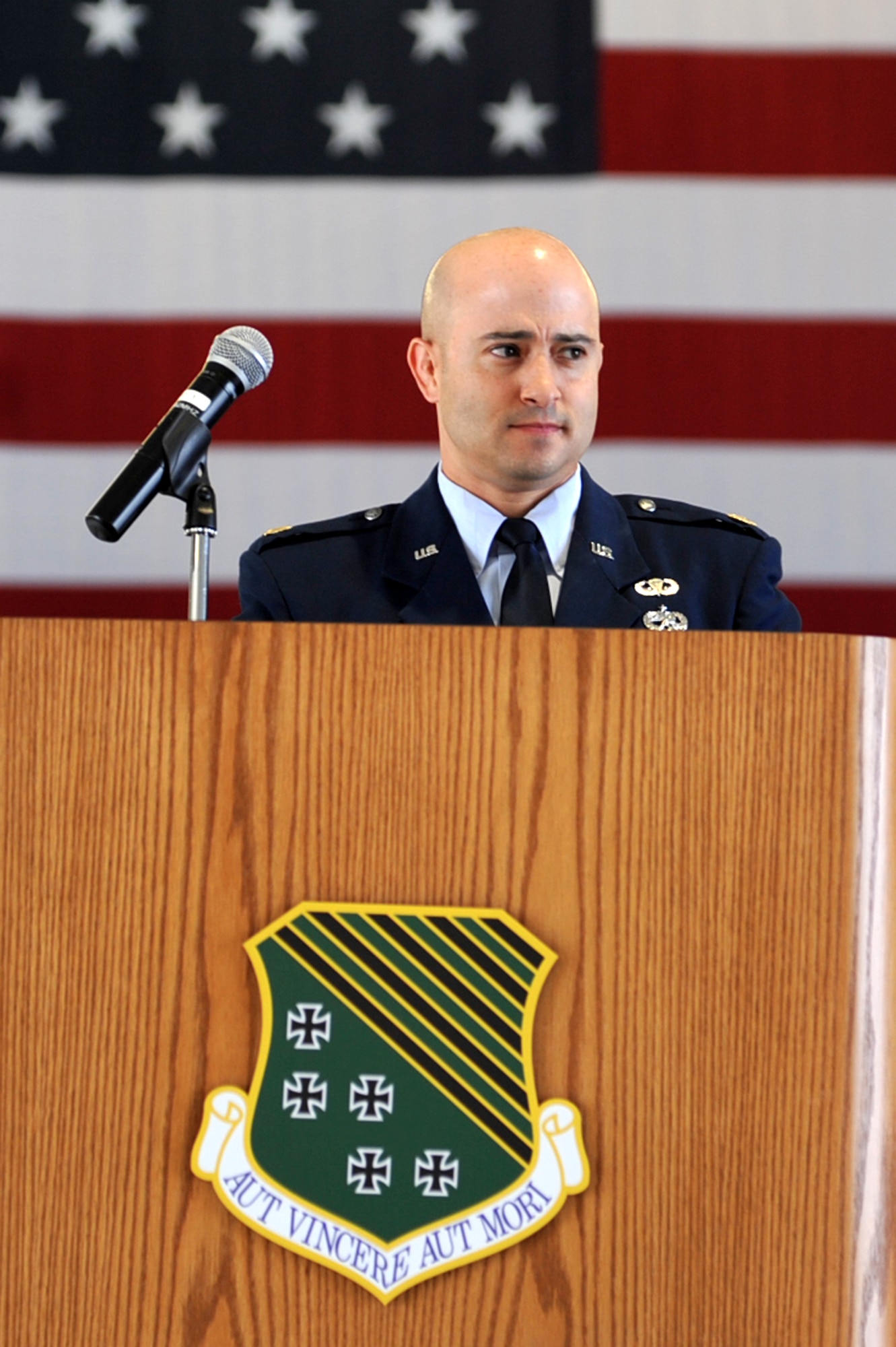 Maj. Dominick Martin, 1st Maintenance Squadron commander, addresses the crowd during the 1 MXS change of command ceremony at Langley Air Force Base, Va., June 10, 2011. Major Martin assumed command of the squadron from Maj. Elizabeth Boehm. (U.S. Air Force photo by Airman 1st Class Camilla Griffin/Released)