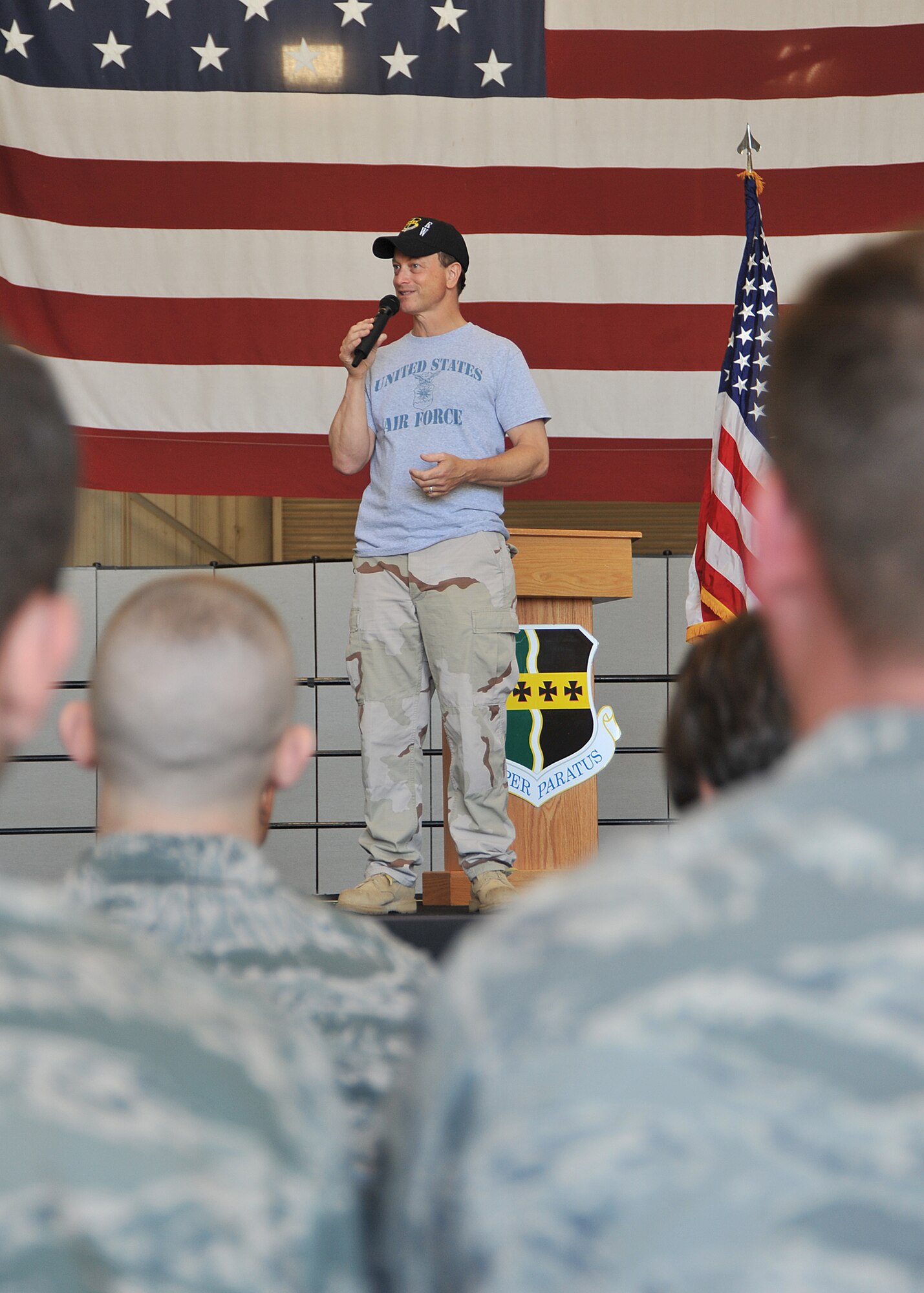 Gary Sinise addresses Airmen at Beale Air Force Base, Calif., June 8 during a talk to the troops after going for a high flight in the U-2 Dragon Lady to 70,000 feet. Mr. Sinise was visiting Beale to document the mission of the U-2 Dragon Lady and meet with Airmen to boost morale.
