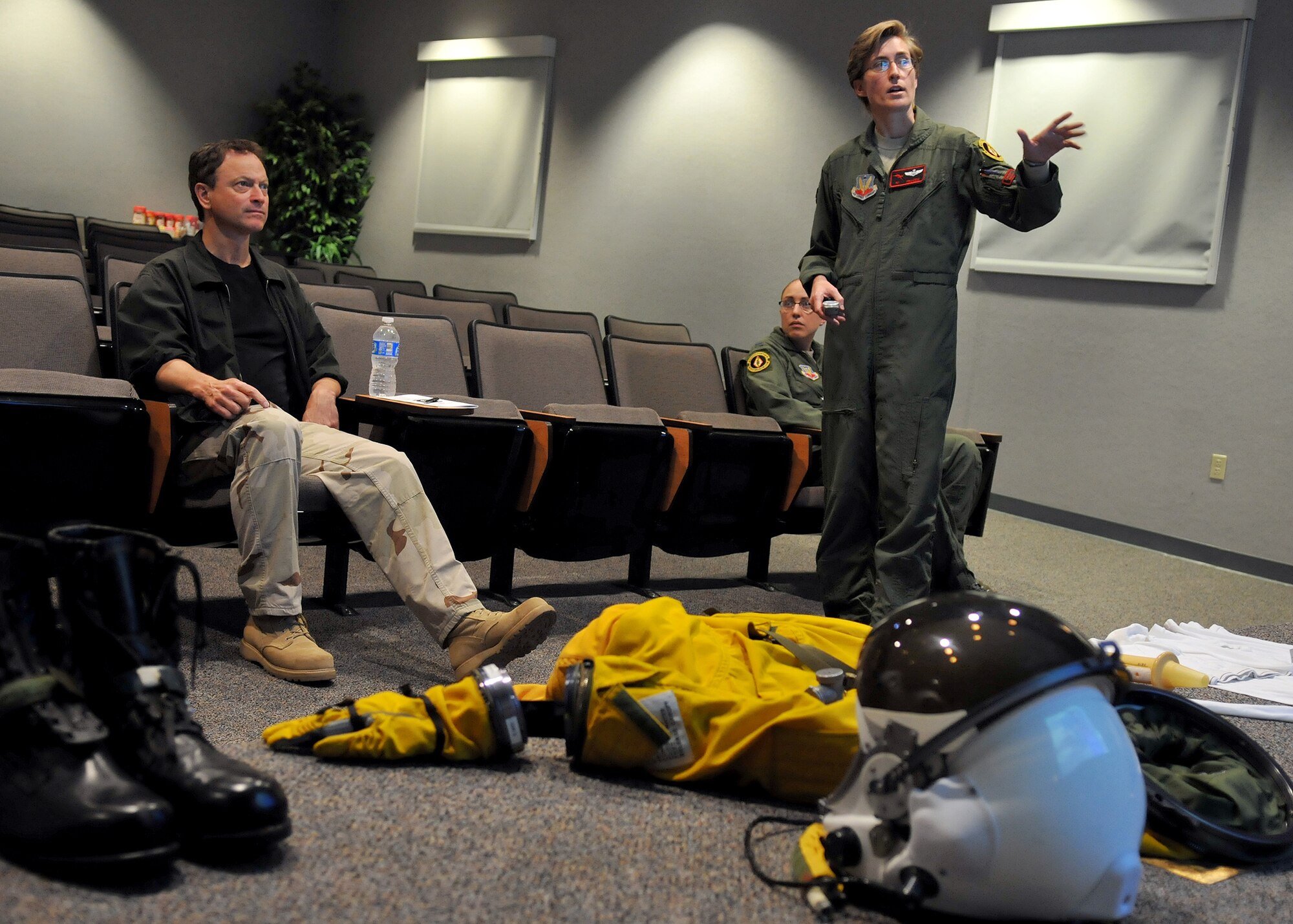 Gary Sinise, actor and military supporter, receives a pre-flight briefing from Princess about the implements and functions of the U-2 flight suit June 7, 2011 at the 9th Physiological Support Squadron, Beale Air Force Base, Calif. Mr. Sinise was visiting Beale to document the mission of the U-2 Dragon Lady and meet with Airmen to boost morale. 