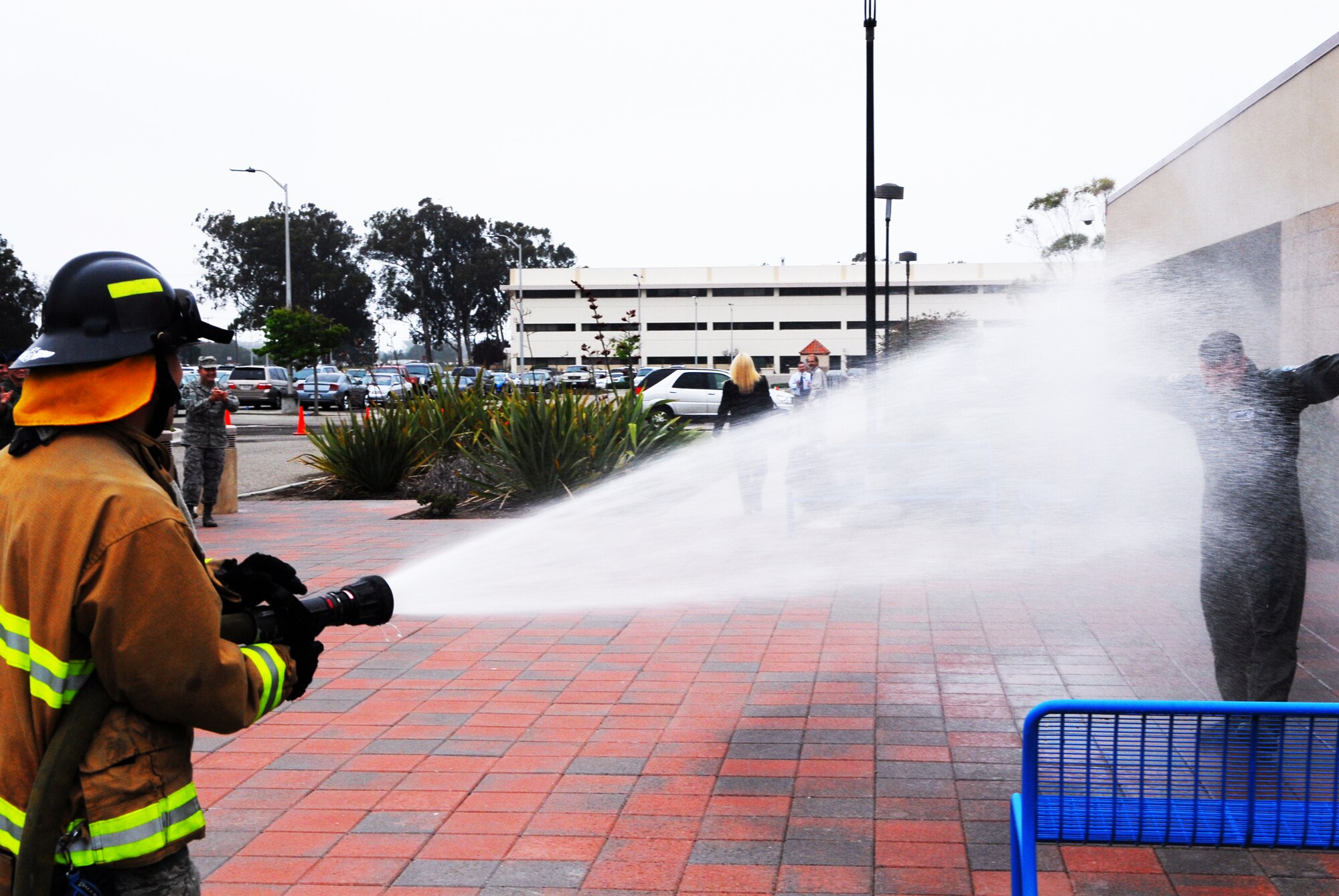 VANDENBERG AIR FORCE BASE, Calif. – Following the launch of a Delta II rocket, the 30th Operations Group commander received the service’s traditional “hose down” celebration at the Western Range Operations Control Center here at 8:25 a.m. Friday, June 10, 2011. Col. Todd Gossett, 30th OG commander, directed his final launch as the commander of the operations group here during the launch of the Aquarius/SAC-D observatory aboard a United Launch Alliance Delta II rocket from Space Launch Complex-2. (U.S. Air Force photo/Senior Airman Steve Bauer) 