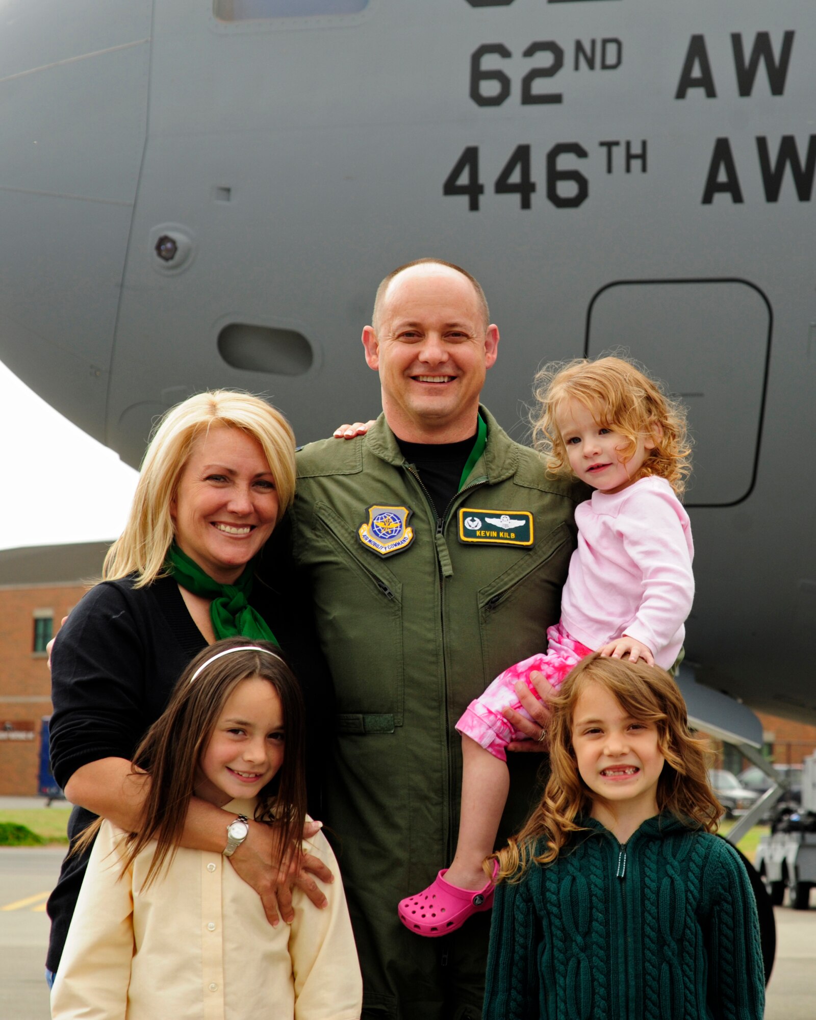 Col. Kevin Kilb (center), 62nd Airlift Wing commander, with his wife, Stacey, and three daughters, Malindi, Piper and Tana. ((U.S. Air Force photo/Adamarie Lewis-Page)