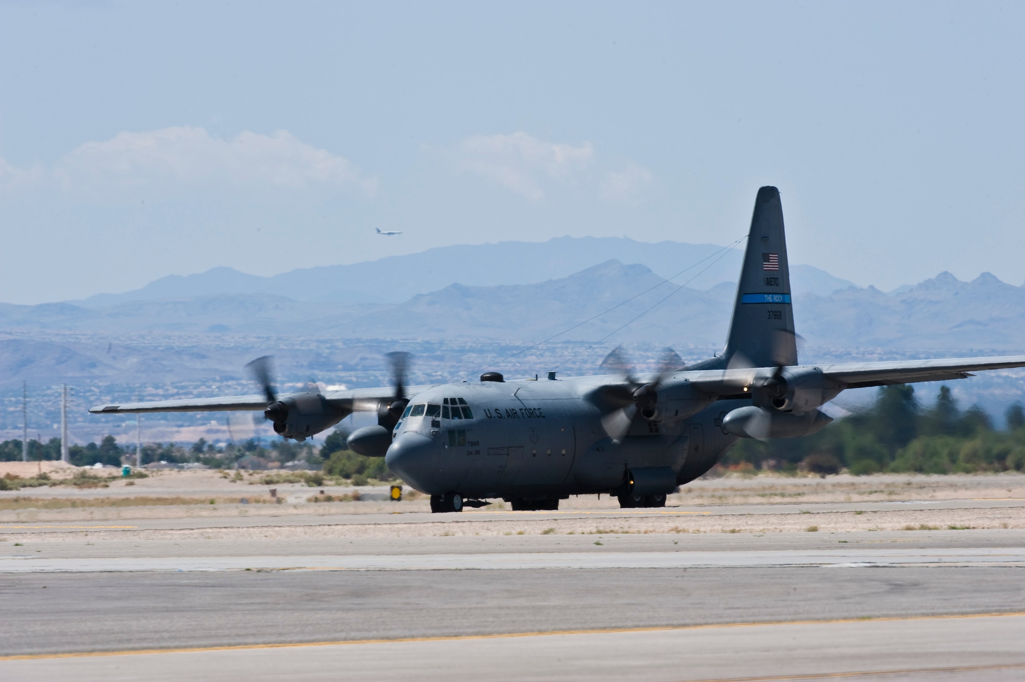 NELLIS AIR FORCE BASE, Nev.--
A C-130 Hercules assigned the U.S. Air Force Weapons School for the Nevada Test and Training Range during the Mission Employment phase, June 8, 2011. More than 5,000 personnel are involved in the final phase of the Weapons School graduate course, resulting in 89 students from 21 separate combat specialties graduating as U.S. Air Force Weapons Officers.(U.S. Air Force photo by Senior Airman Brett Clashman)
