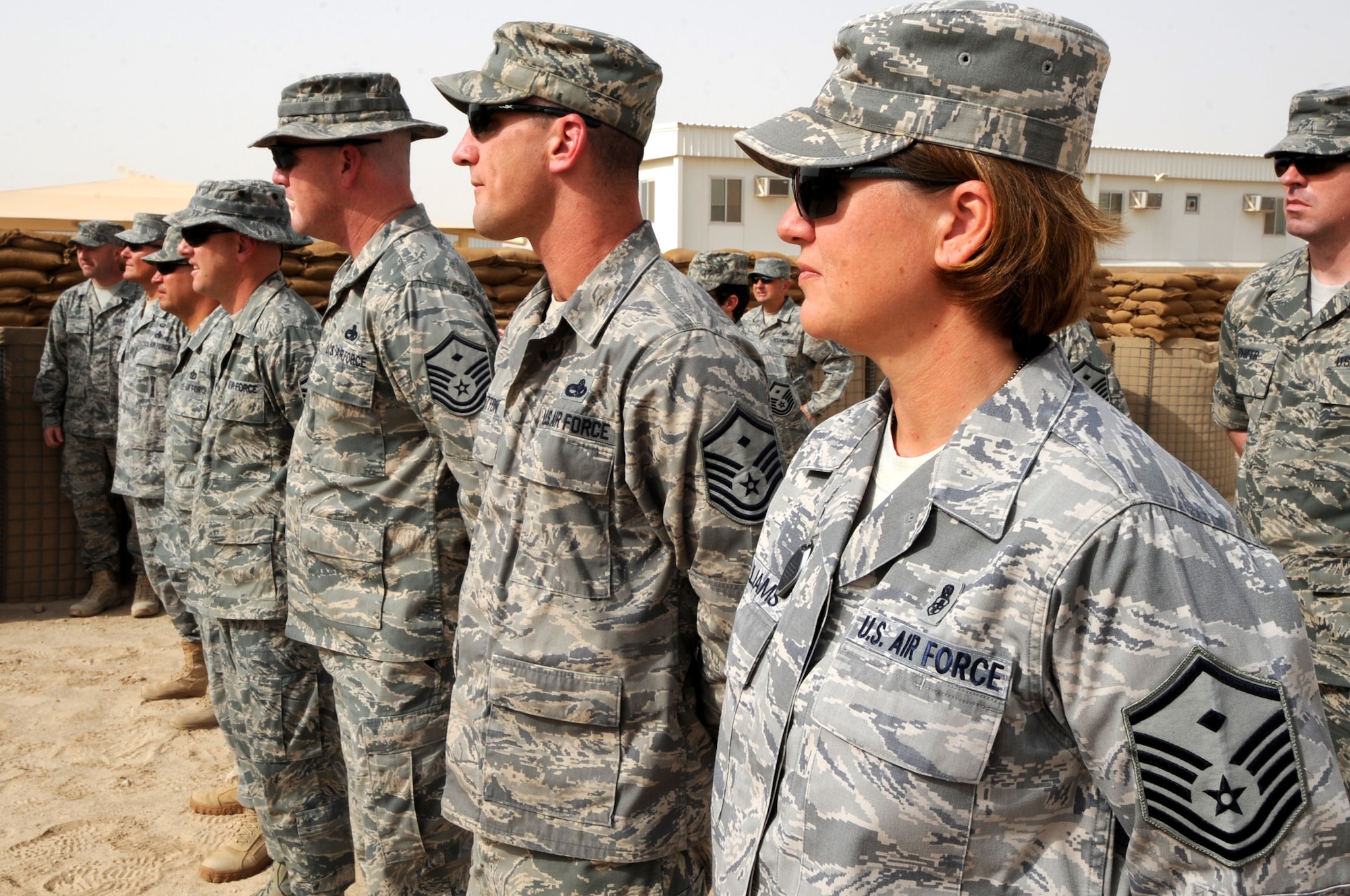 First sergeants deployed with the 386th Air Expeditionary Wing in Southwest Asia gathered June 7 to dedicate Building 353 as Airey Hall in honor of Chief Master Sgt. Paul Wesley Airey, the first chief master sergeant of the Air Force. (U.S. Air Force photo by Senior Airman Cynthia Spalding)