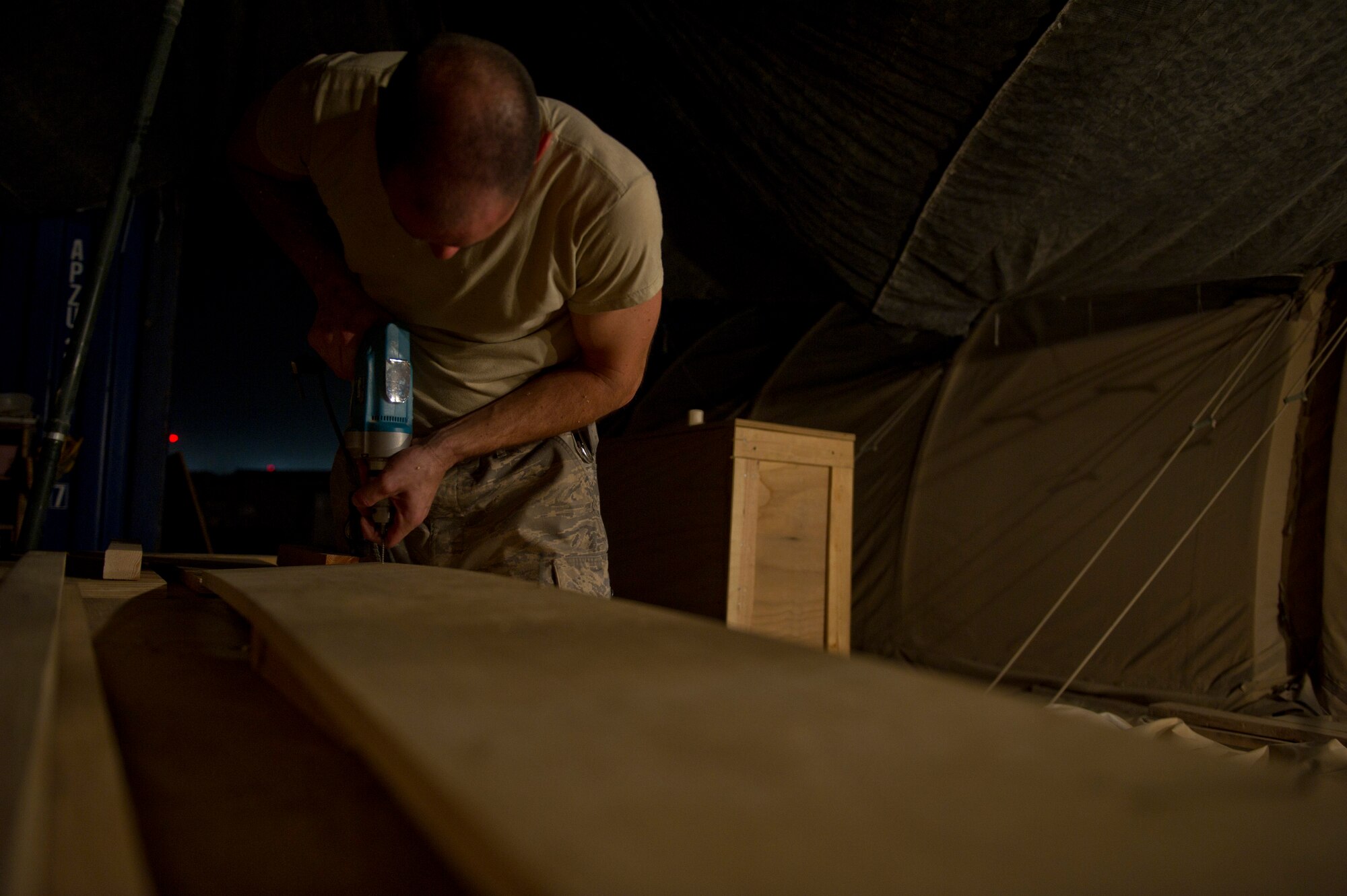 Master Sgt. Jason Reininger, 451st Expeditionary Aeromedical Evacuation Squadron Detachment 1 Contingency Aeromedical Staging Facility, aerospace medical technician, builds a child-size coffin that will be turned over to the Role 3 hospital at Camp Bastion, Afghanistan. Sgt. Reininger volunteered to build the coffin after finding out there was a need for one. Sgt. Reininger is a Reservist deployed from the 419th Medical Squadron, Hill AFB, Utah. (U.S. Air Force photo by Master Sgt. Adrian Cadiz)


