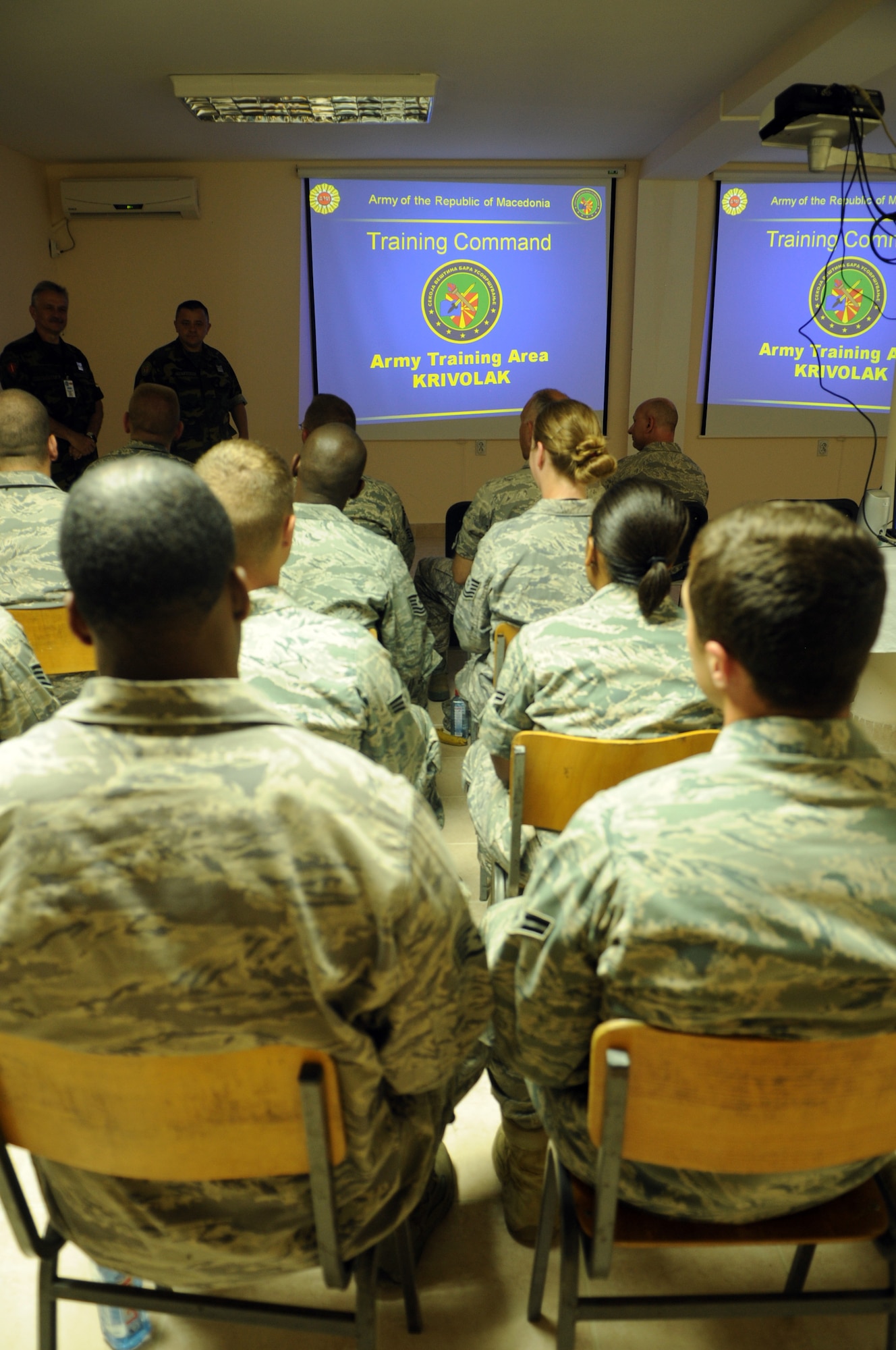 KRIVOLAK, Macedonia -- A group of service members supporting the 2011 Medical Training Exercise in Central and Eastern Europe receive a briefing about the Macedonian Army Training Area June 9. The service members also toured the training area, which is the largest Macedonian military base. An annual Chairman of the Joint Chiefs of Staff-sponsored regional and multilateral exercise, MEDCEUR is designed to provide medical training and operational experience in a deployed environment for U.S. and partner nations. The countries participating in this year's MEDCEUR are Macedonia, Montenegro, Bosnia and Herzegovina, Serbia, Slovenia and Norway. (U.S. Air Force photo/Staff Sgt. Julius Delos Reyes)