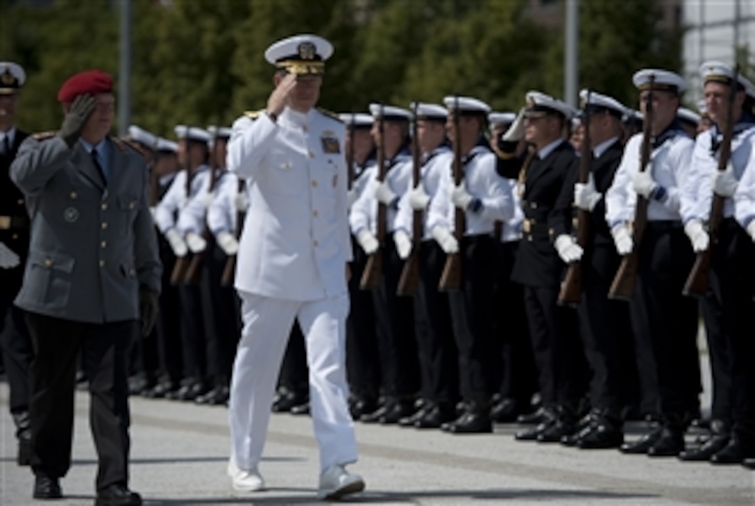 Chairman of the Joint Chiefs of Staff Adm. Mike Mullen and Chief of Staff of the German Armed Forces Gen. Volker Wieker inspect the German Guard of Honor during a welcoming ceremony in Berlin, Germany, on June 9, 2011.  Mullen is on a seven-day trip visiting Egypt and Europe to meet with counterparts and leaders.  