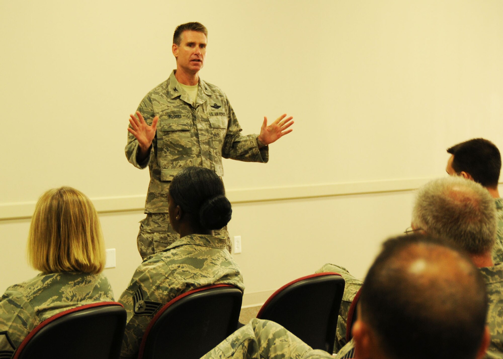 Colonel  Destry Rogers, 919th Special Operations Wing vice commander, makes welcoming remarks June 10 to wing reservists who recently returned home from a deployment in support of Overseas Contingency Operations.   The Duke Field reservists were attending an inprocessing briefing by a host of base support agencies focused on gradually reintegrating the Airmen back to home station service and civilian employment.  (U.S. Air Force photo/Dan Neely)