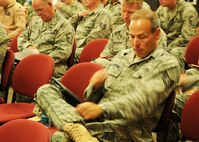 A recent deployment returnee, Tech. Sgt.  Kelly Hagbom, 919th Maintenance Squadron, reviews inprocessing paperwork in Duke Field’s deployment processing facility June 10.  Dozens of Duke Field reservists were attending an inprocessing briefing by a host of base support agencies focused on gradually reintegrating the Airmen back to home station service and civilian employment.  (U.S. Air Force photo/Dan Neely)